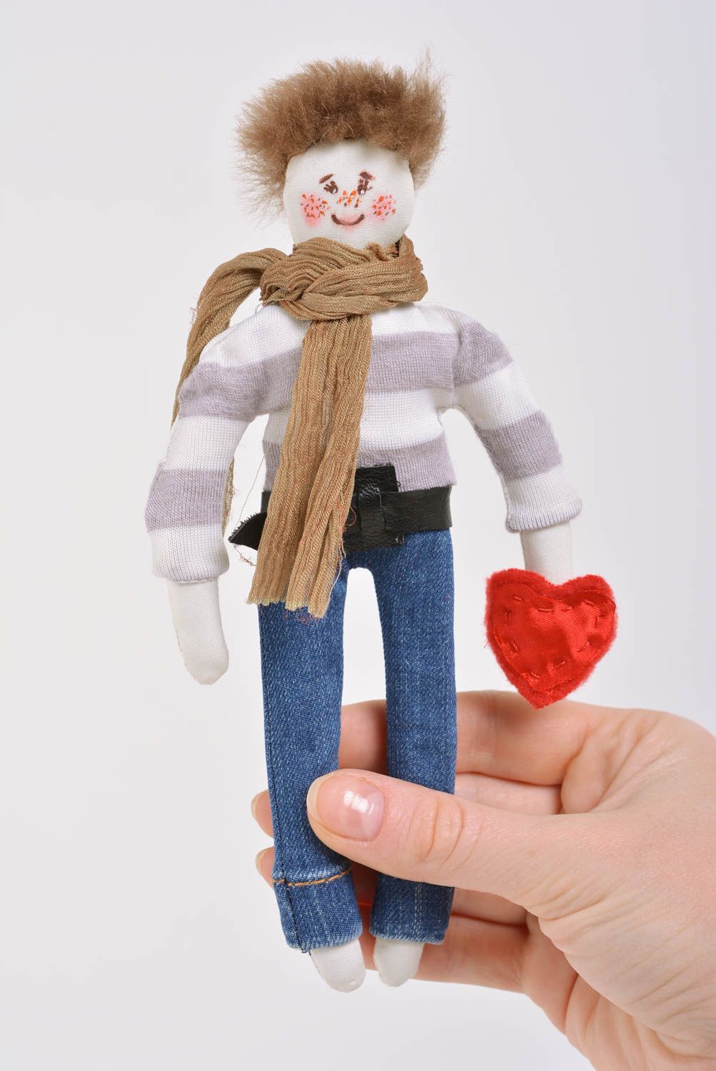 Handmade designer fabric soft toy boy in jeans and striped sweater with heart photo 4