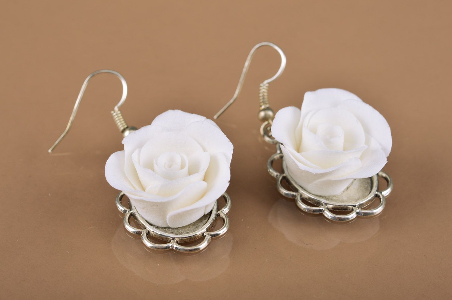 Beautiful festive elegant handmade polymer clay flower earrings in the shape of white roses  photo 2