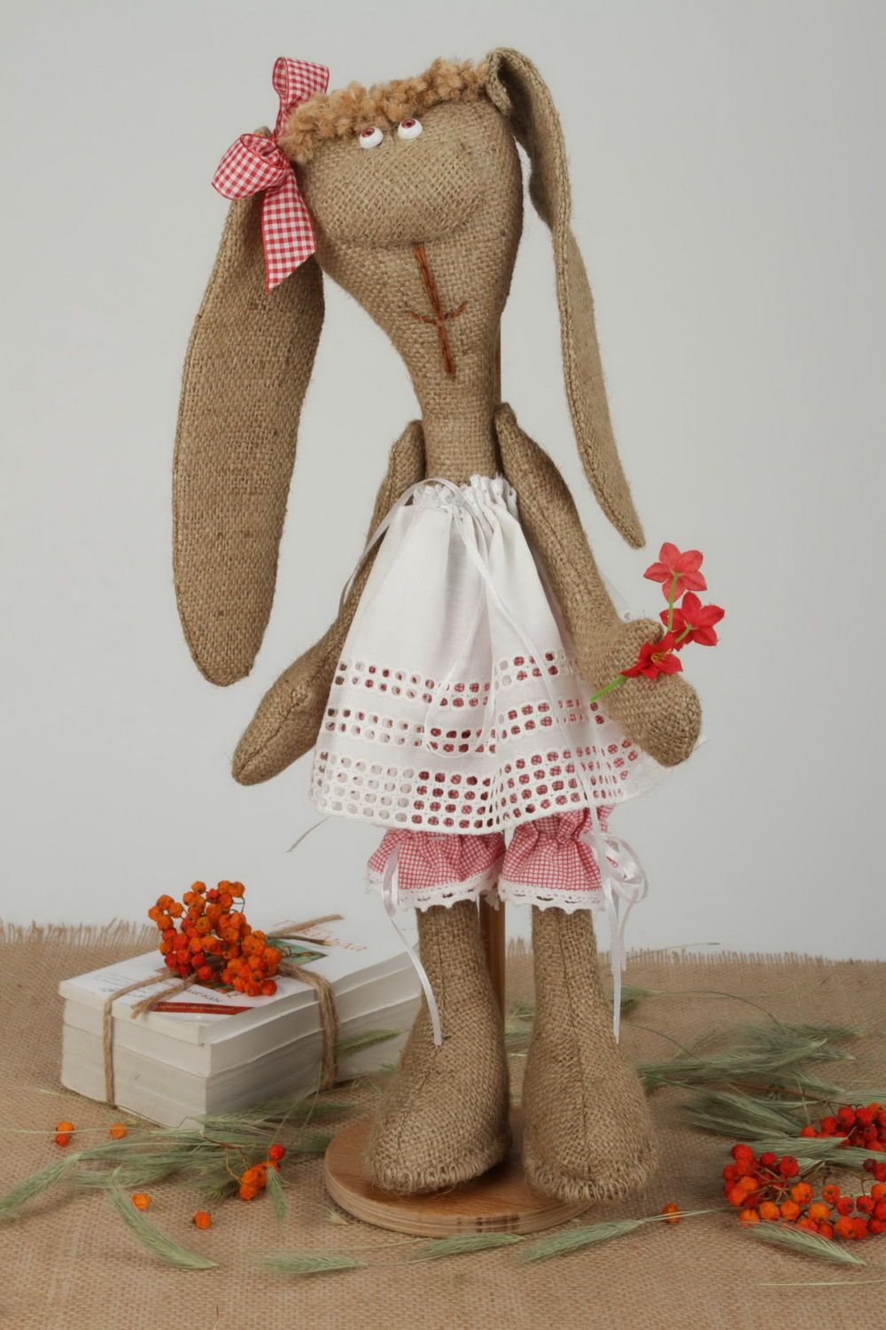 Soft toy on a wooden stand Bunny photo 1