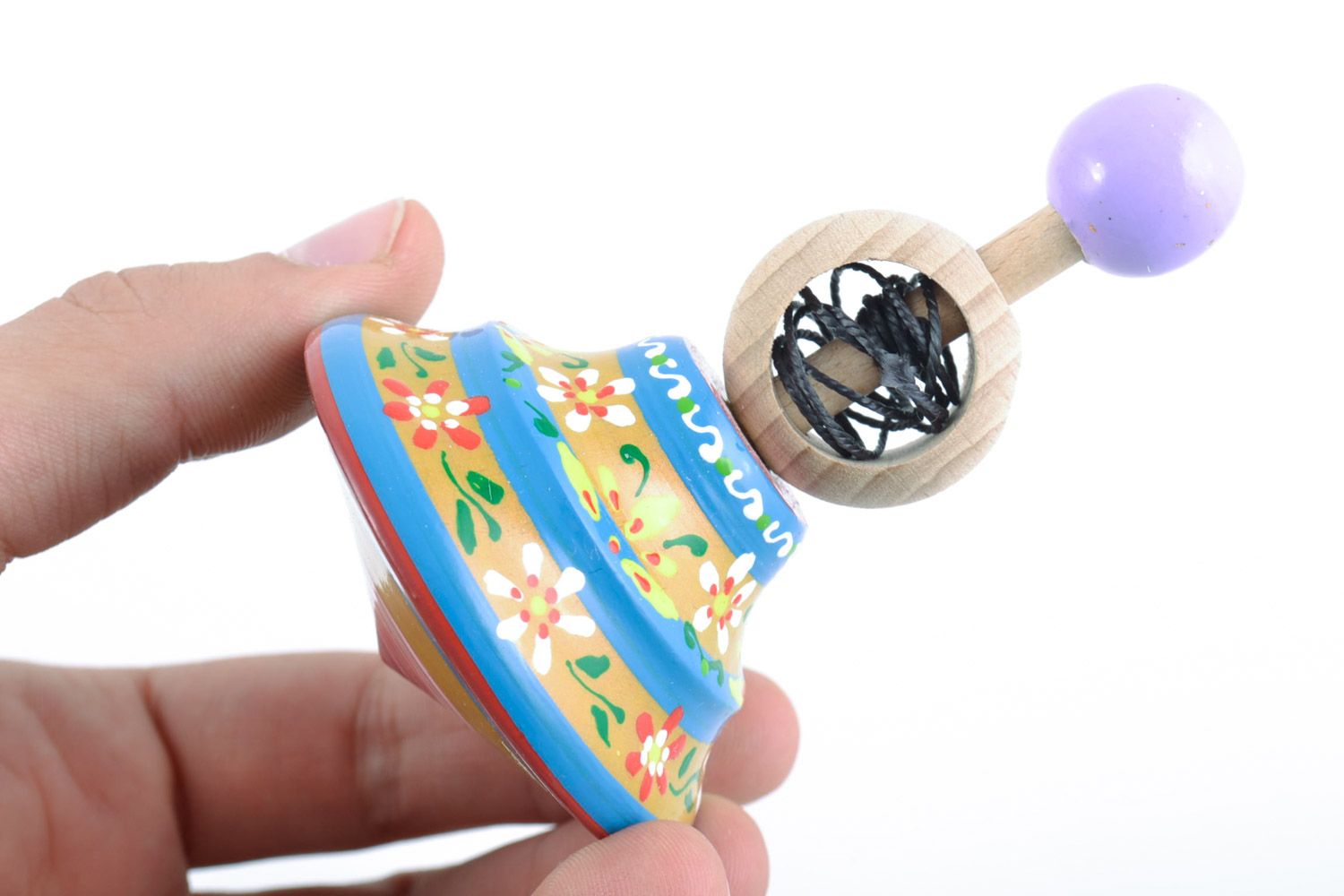 Petit jouet toupie fait main en bois naturel de hêtre multicolore à motif floral photo 3