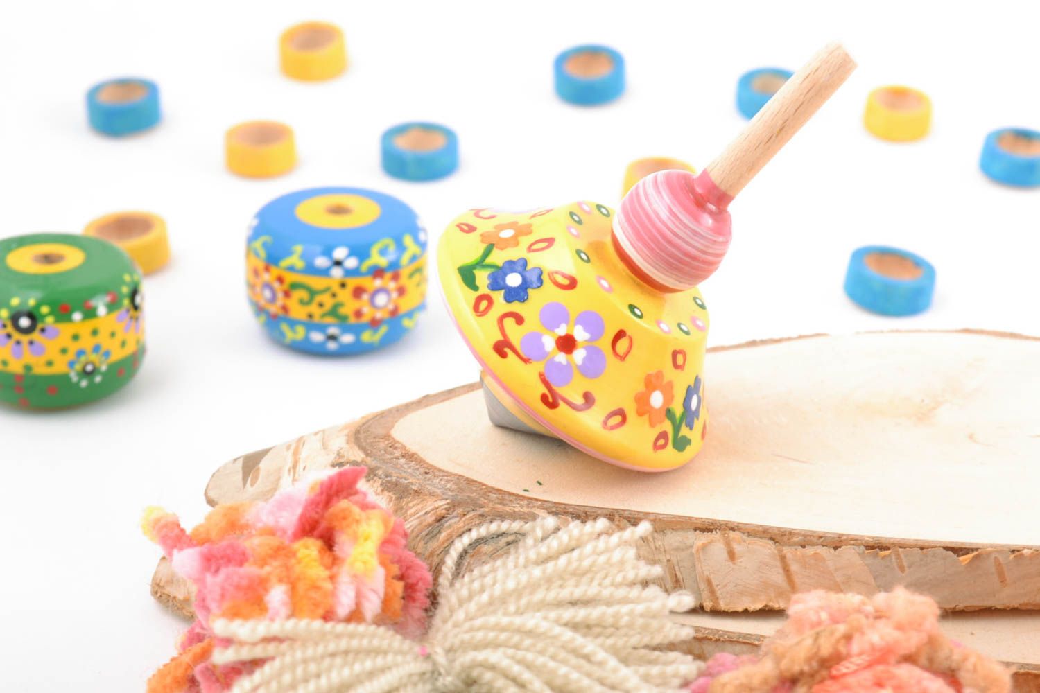 Bright small handmade painted wooden spin top smart toy for children photo 1