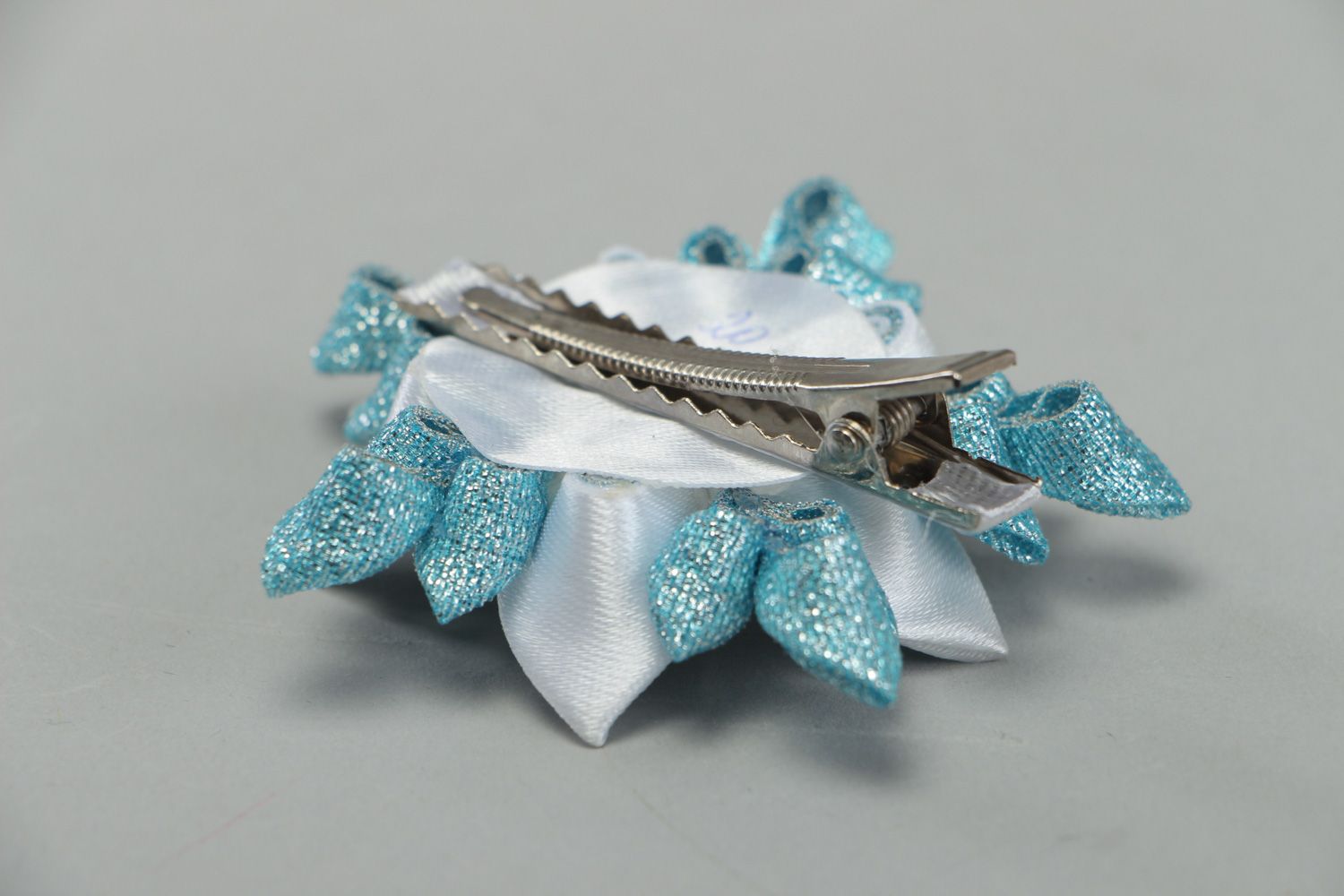 Handmade hair clip with kanzashi flower made of gold cloth and satin in blue color photo 3