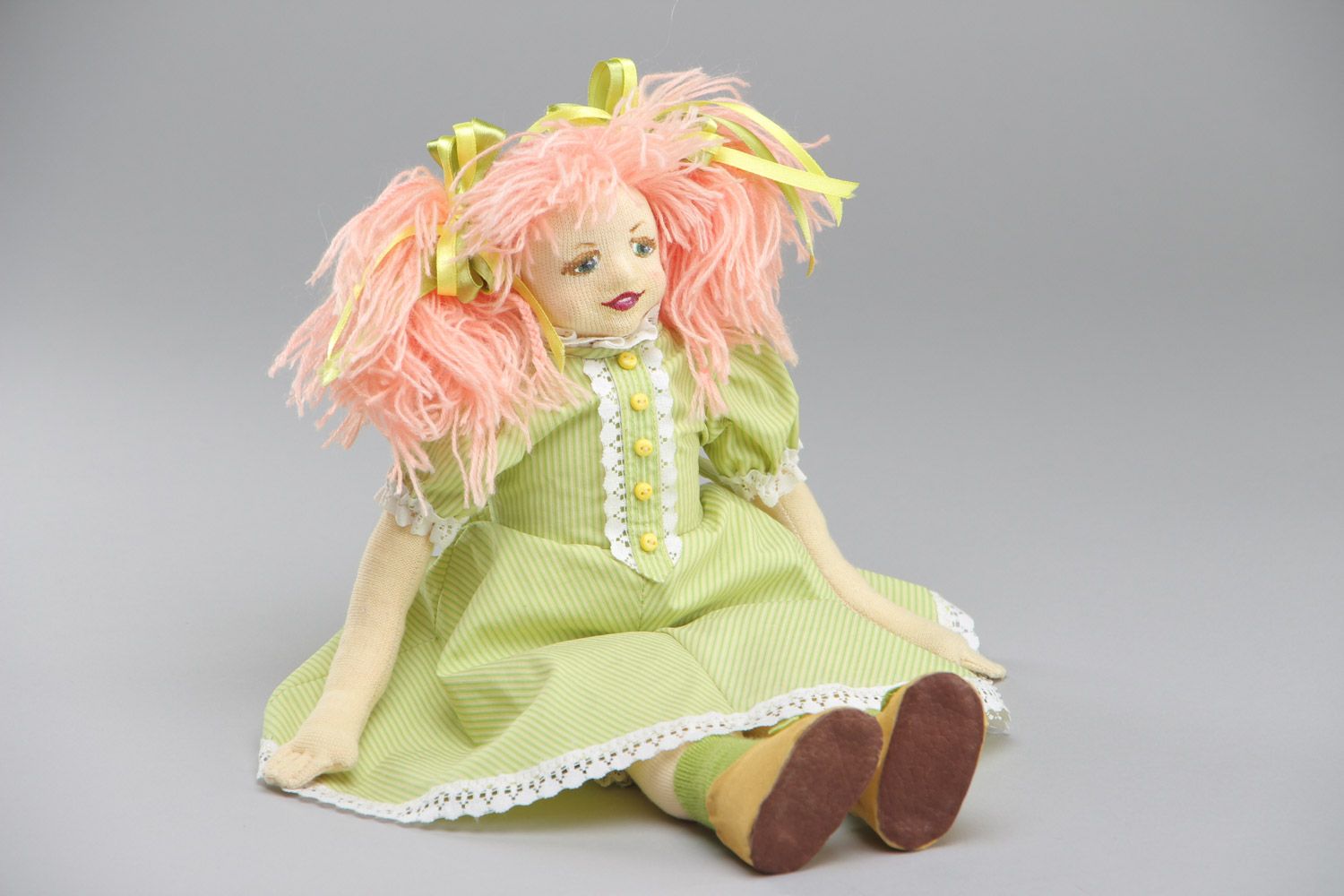 Handmade designer fabric soft doll of average size in green dress photo 2