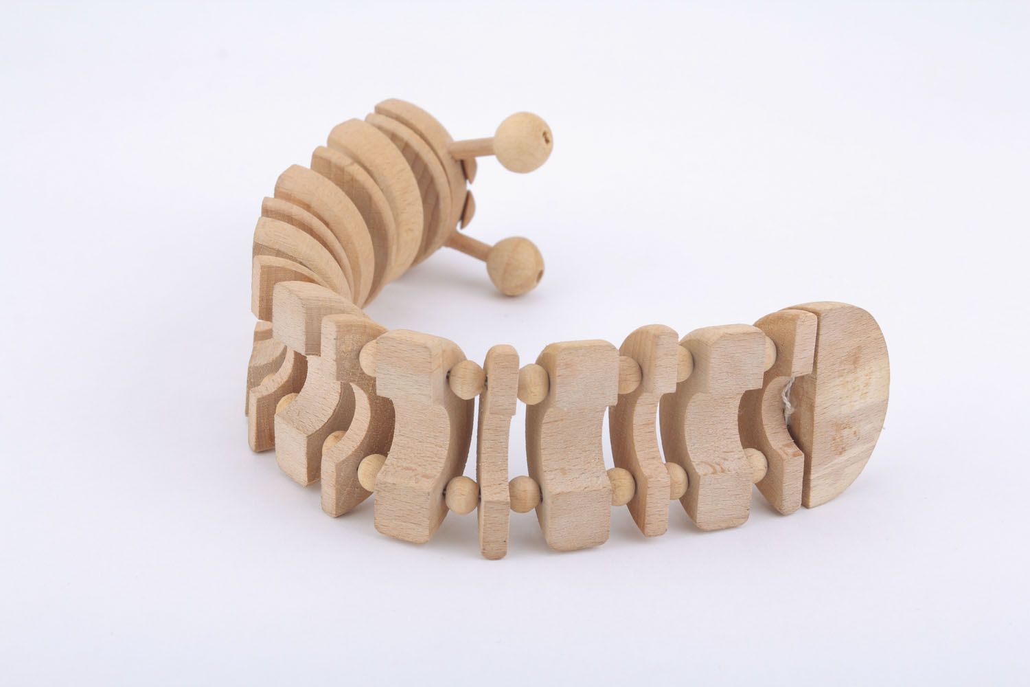 Wooden toy caterpillar photo 4
