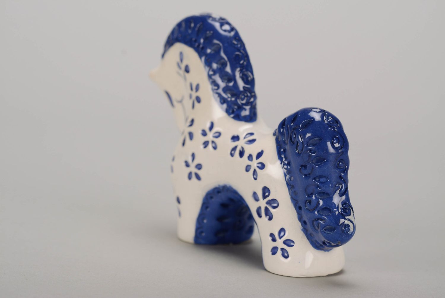 Ceramic horse with blue flowers pattern photo 2