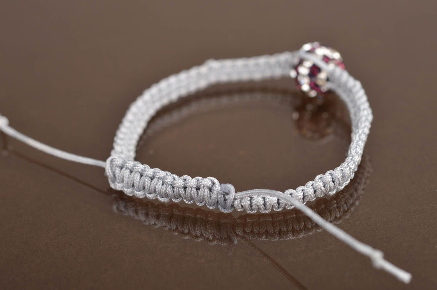 Beautiful thin gray woven friendship bracelet with ties and beads photo 5