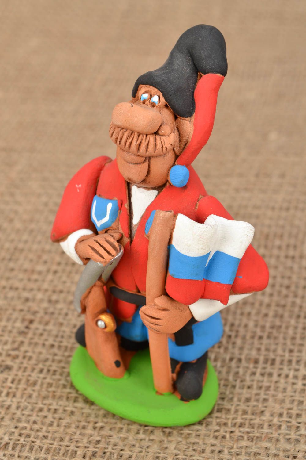 Handmade Figurine aus Ton Kosak mit Gewehr foto 1