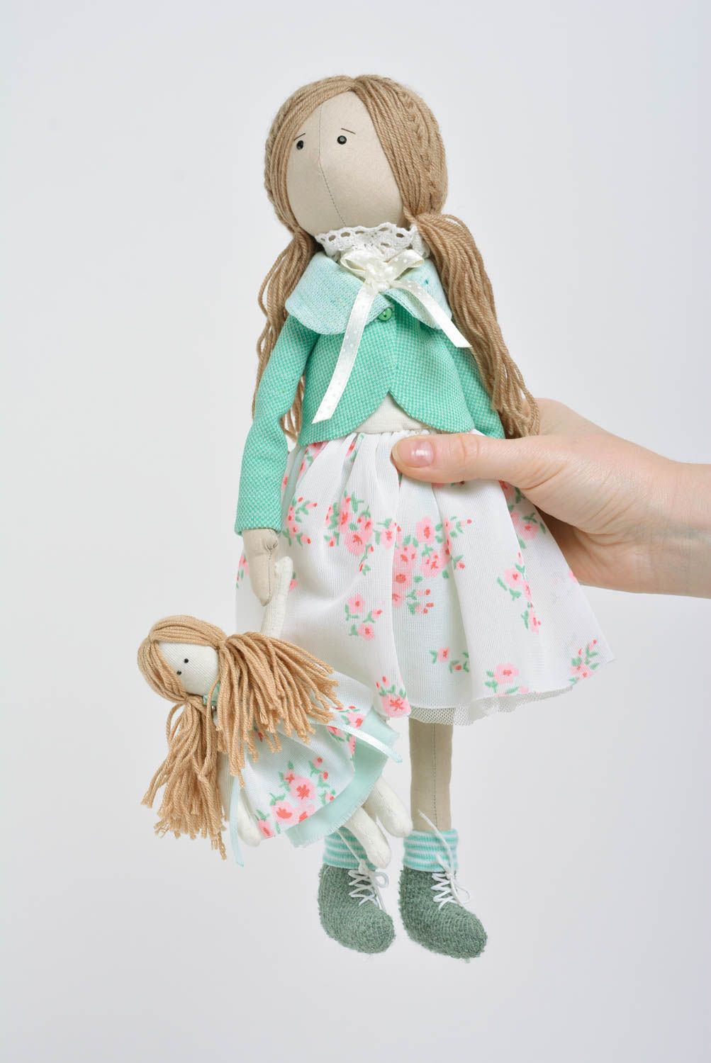 Handmade designer fabric soft doll girl in mint jacket with little soft toy photo 4