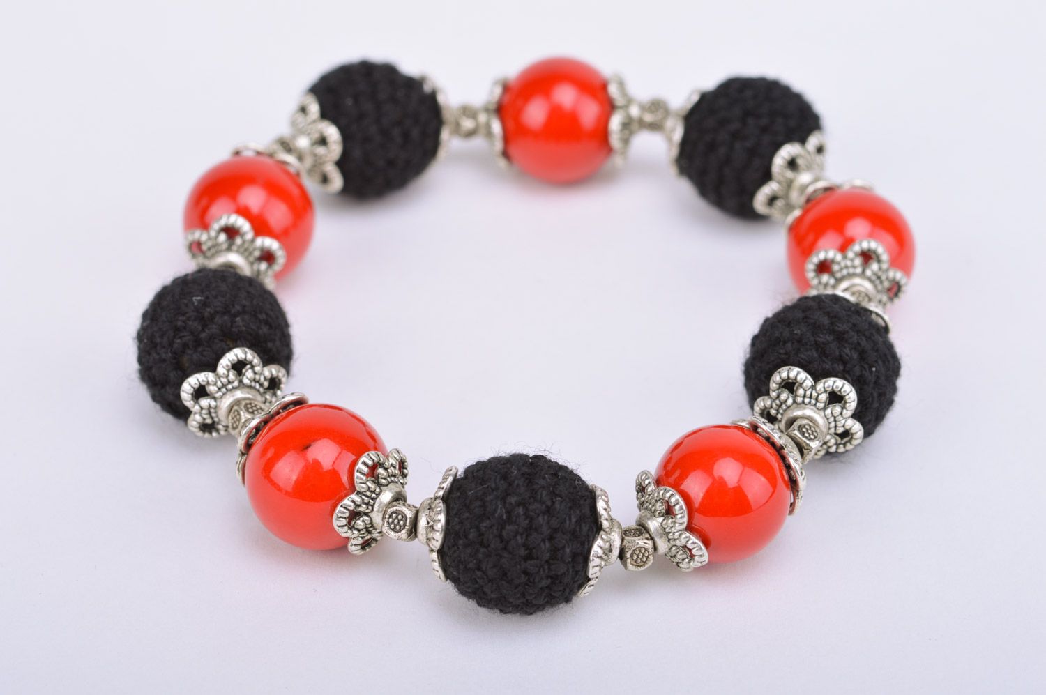 Handmade red and black wrist bracelet with beads crocheted over with threads Passion photo 5
