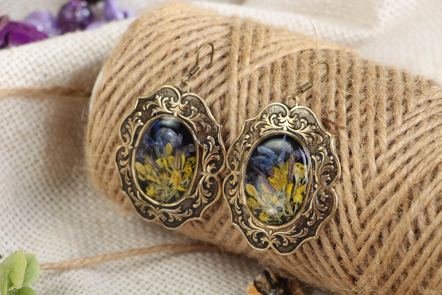 Brass pendant earrings with wildflowers photo 1