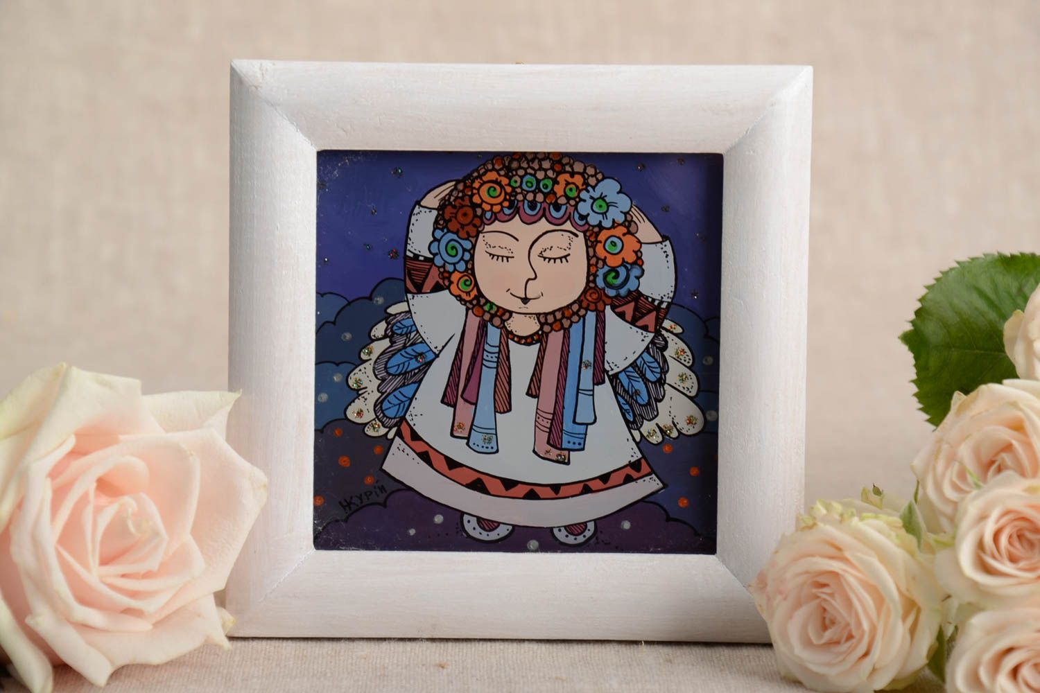 Jolie peinture ethnique avec ange faite main dans cadre aux couleurs à l'huile photo 1