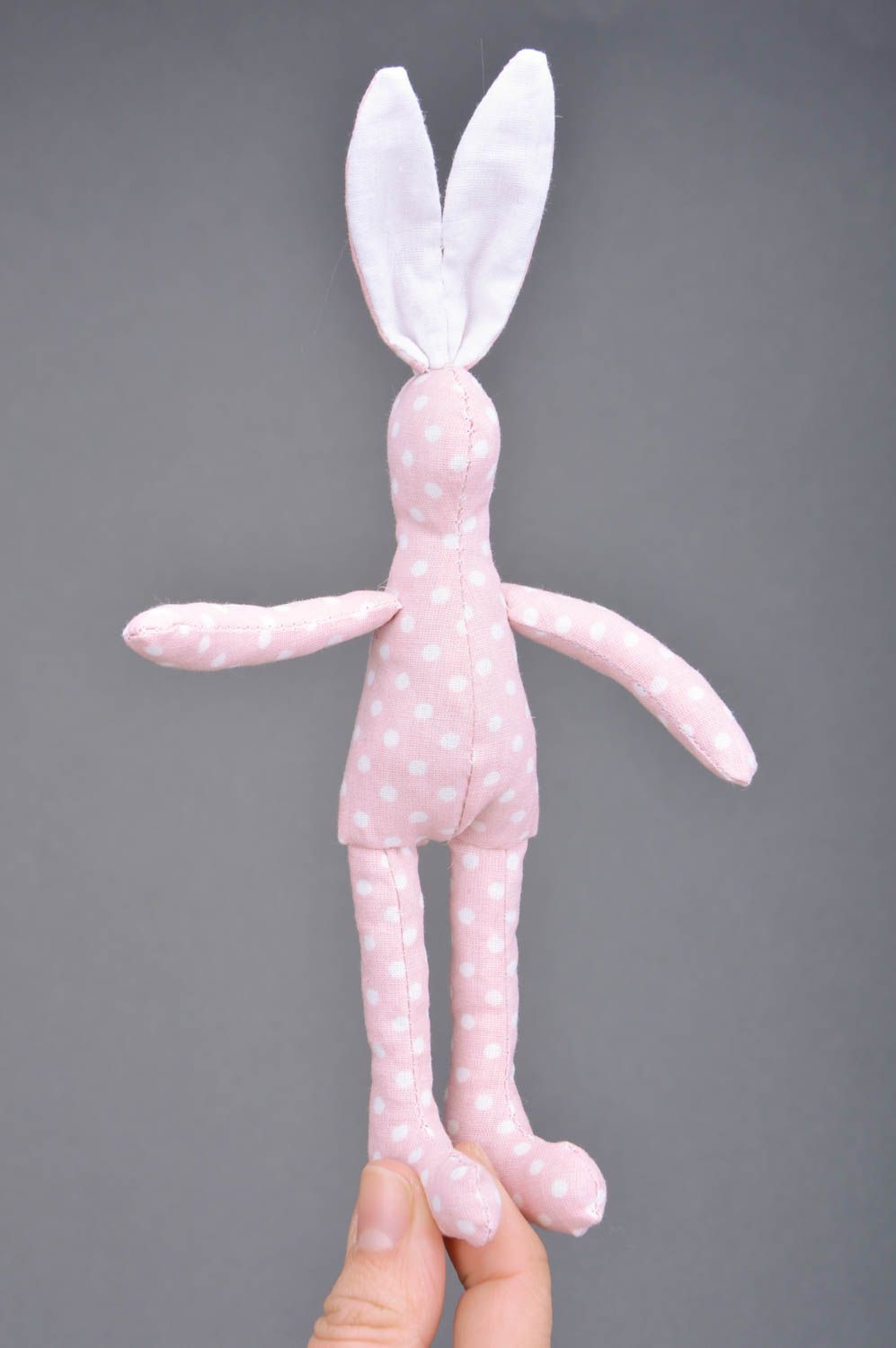 Beautiful handmade fabric soft toy hare of pink color with polka dot pattern photo 2