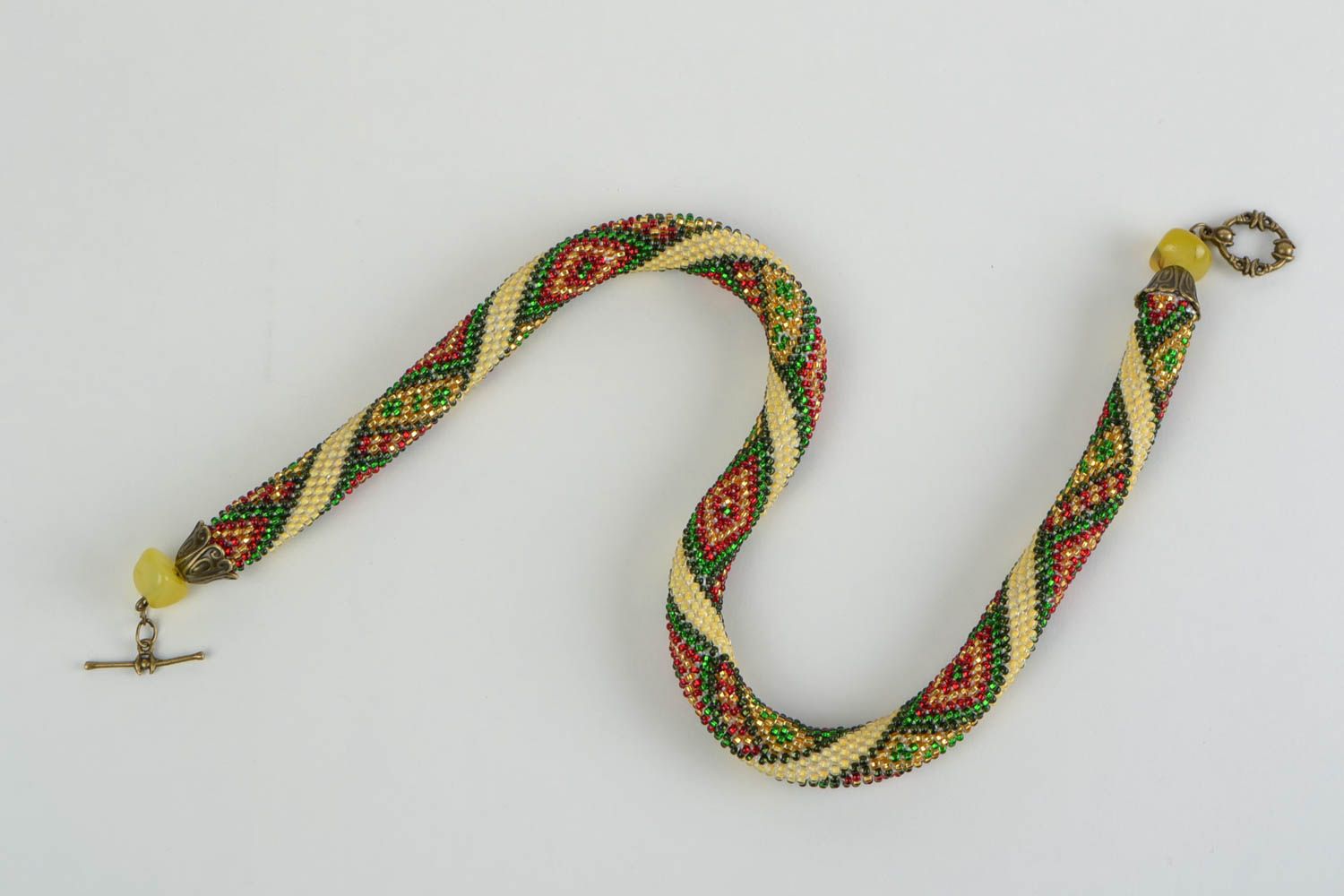 Collar de abalorios artesanal con forma de cuerda de colores verde y dorado bonito  foto 2