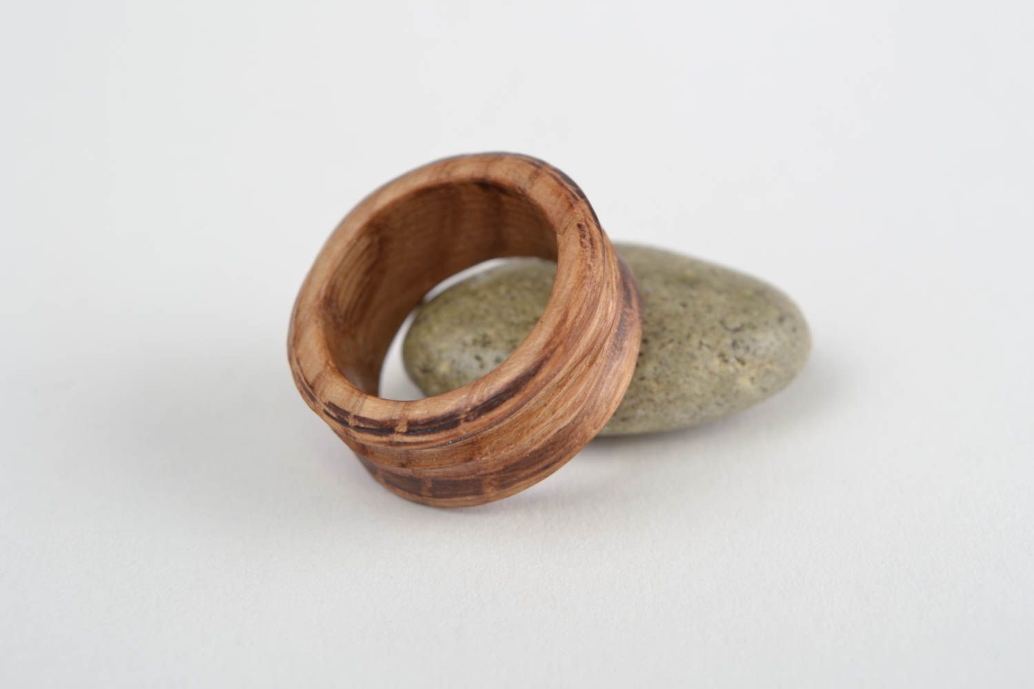 Handmade carved wooden jewelry ring of brown color of laconic design unisex photo 1