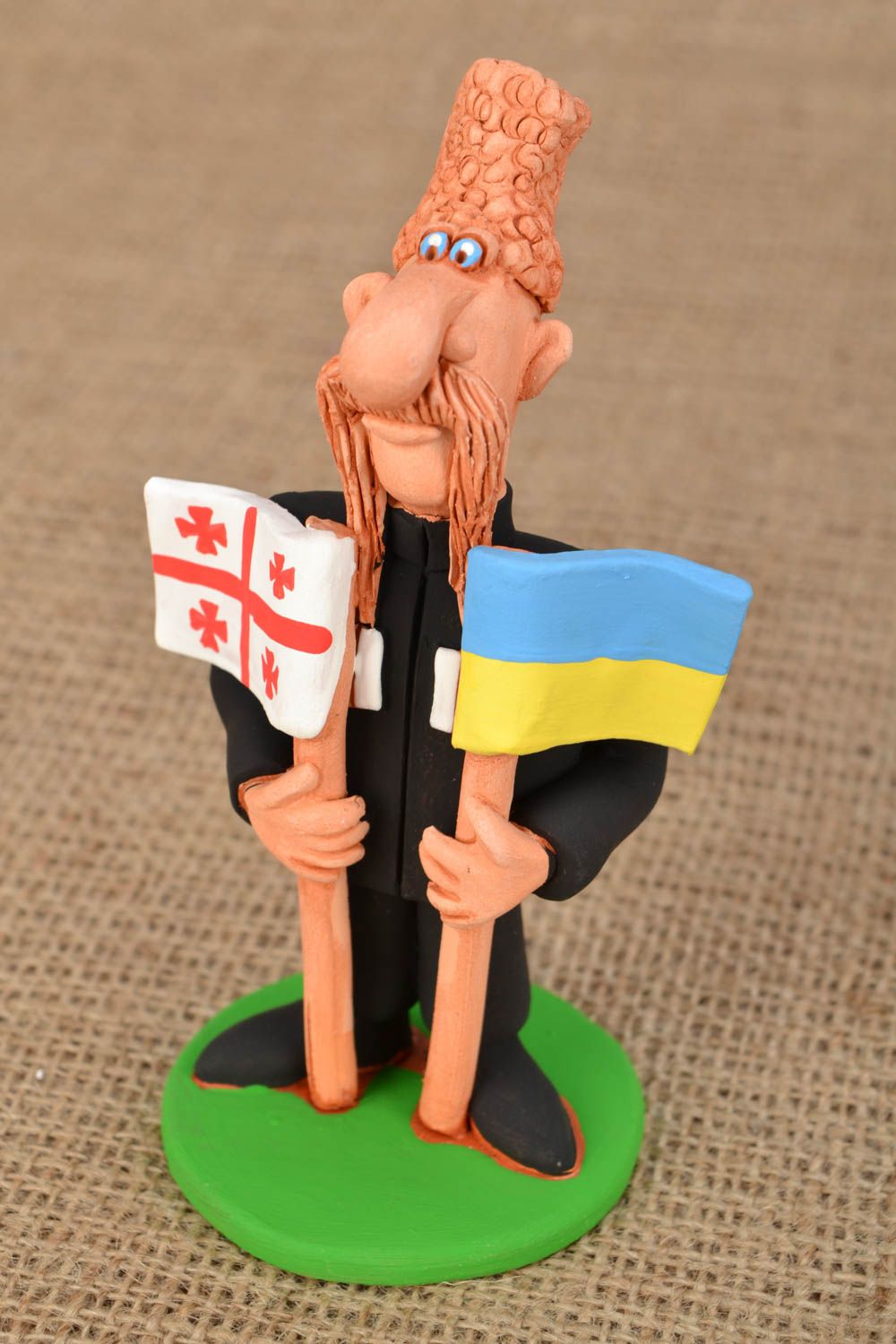 Ceramic figurine Cossack with Two Flags photo 1