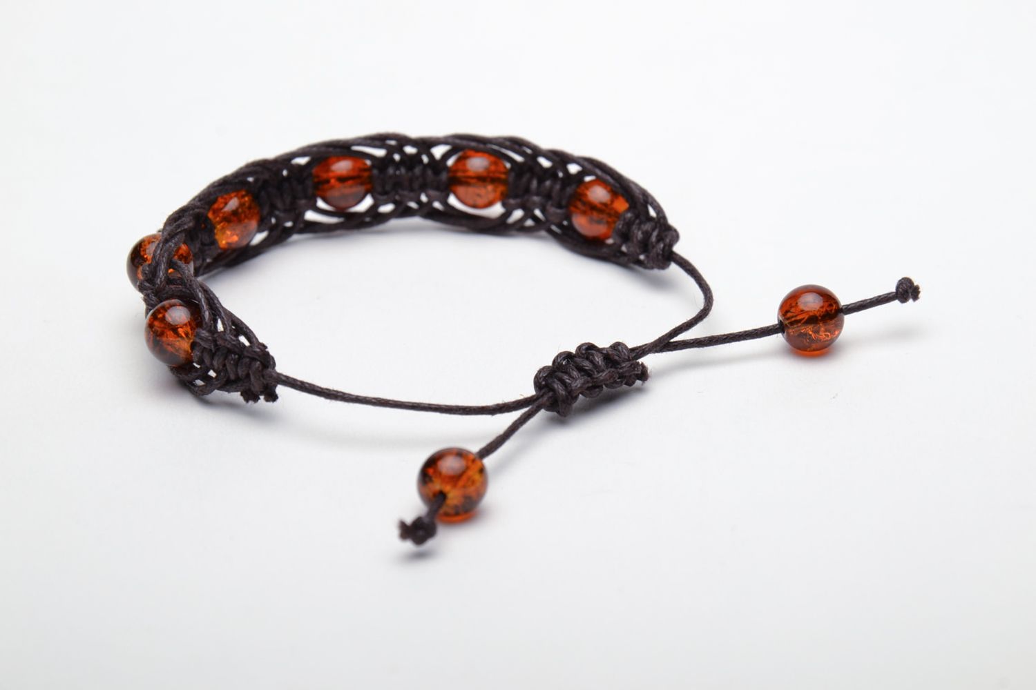 Bracelet with glass beads of amber color photo 4