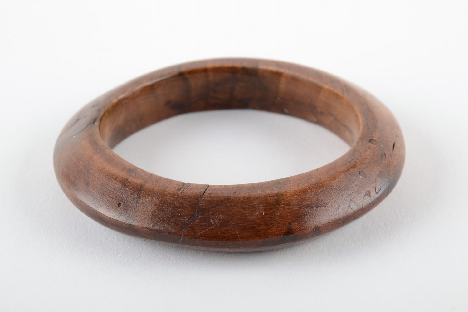 Elegant thin handmade wrist bracelet carved of wood and varnished for women photo 3