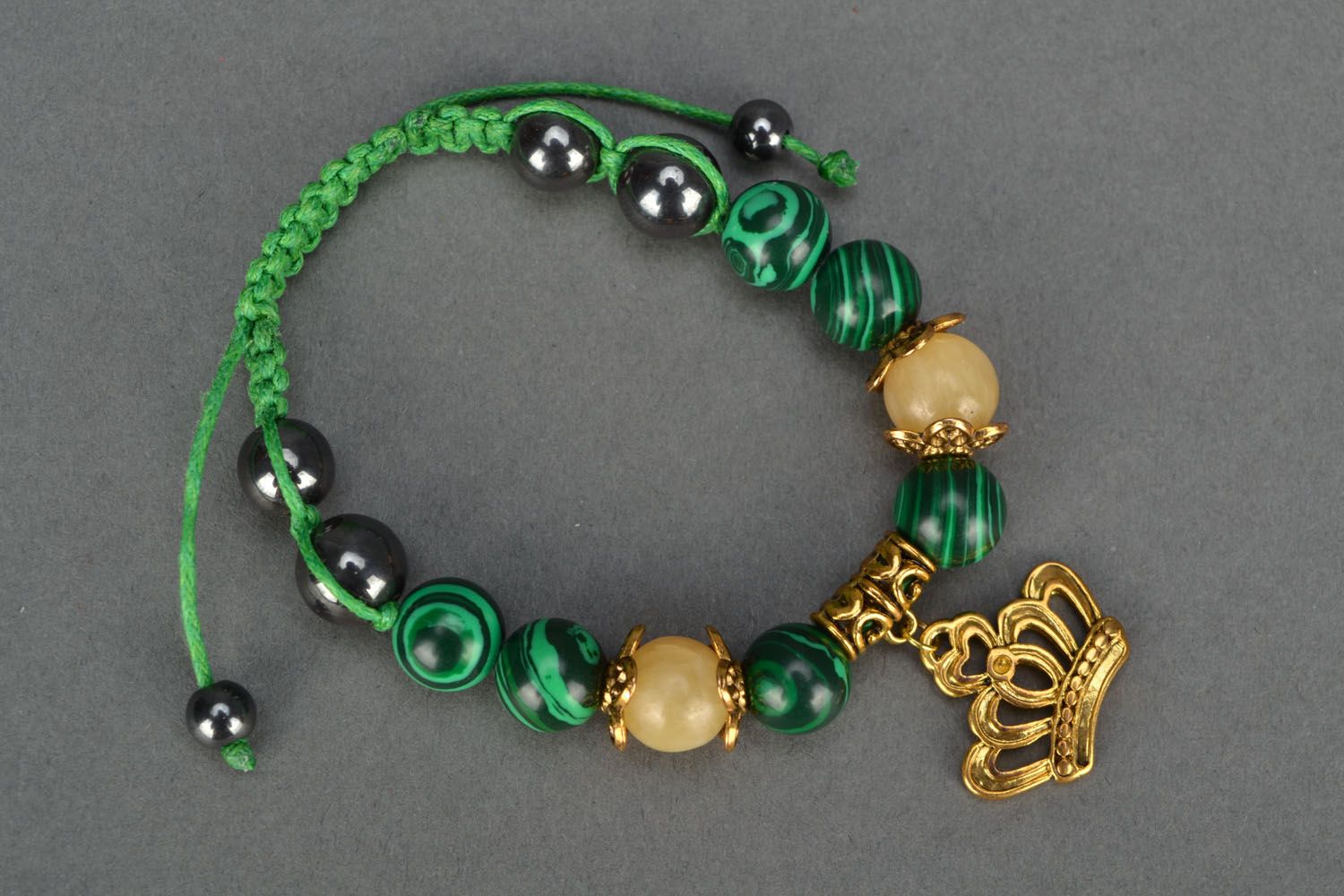 Bracelet with natural stones and charms photo 2