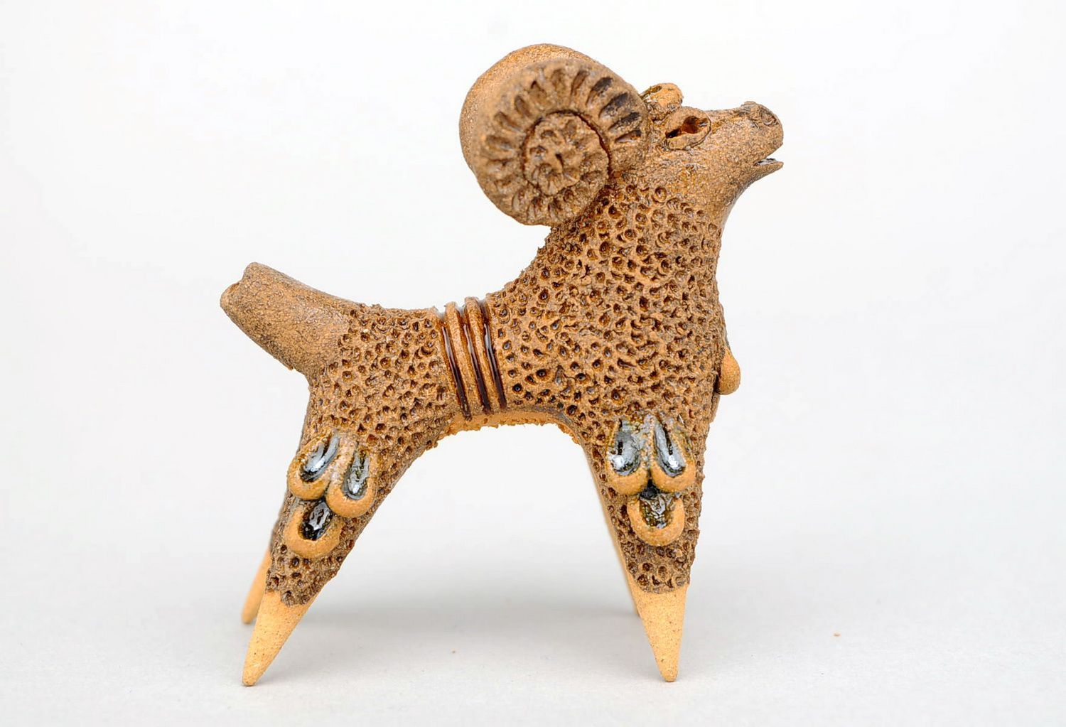 Clay penny whistle in the form of ram photo 4