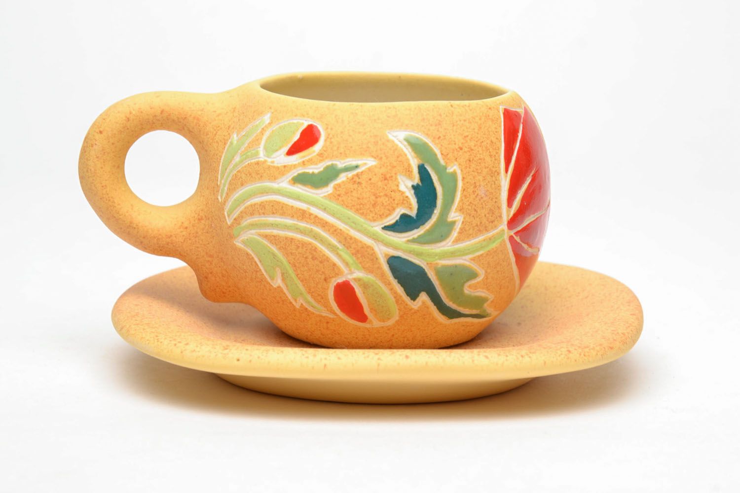 Clay yellow drinking cup with floral pattern with handle and saucer  photo 3