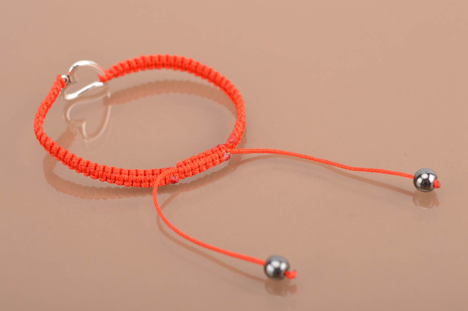 Handmade red bracelet made of silk threads with insert in shape of heart photo 5