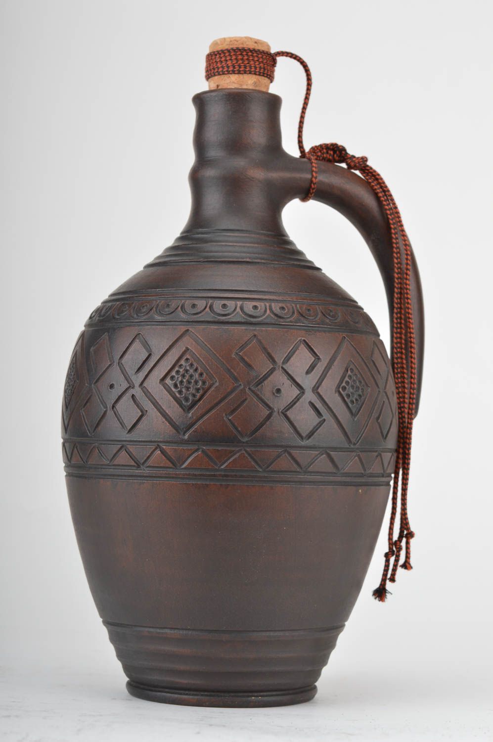 Botella cerámica con corcho decorativa artesanal marrón con ornamento 330 ml foto 2