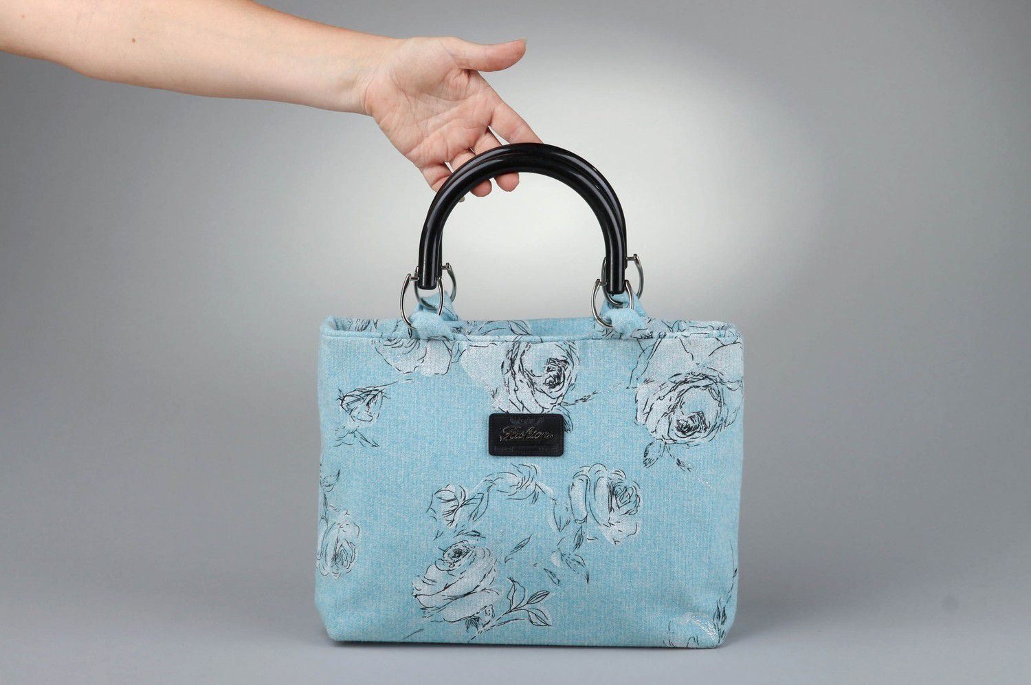 Handgemachte blaue Handtasche aus Textil foto 5