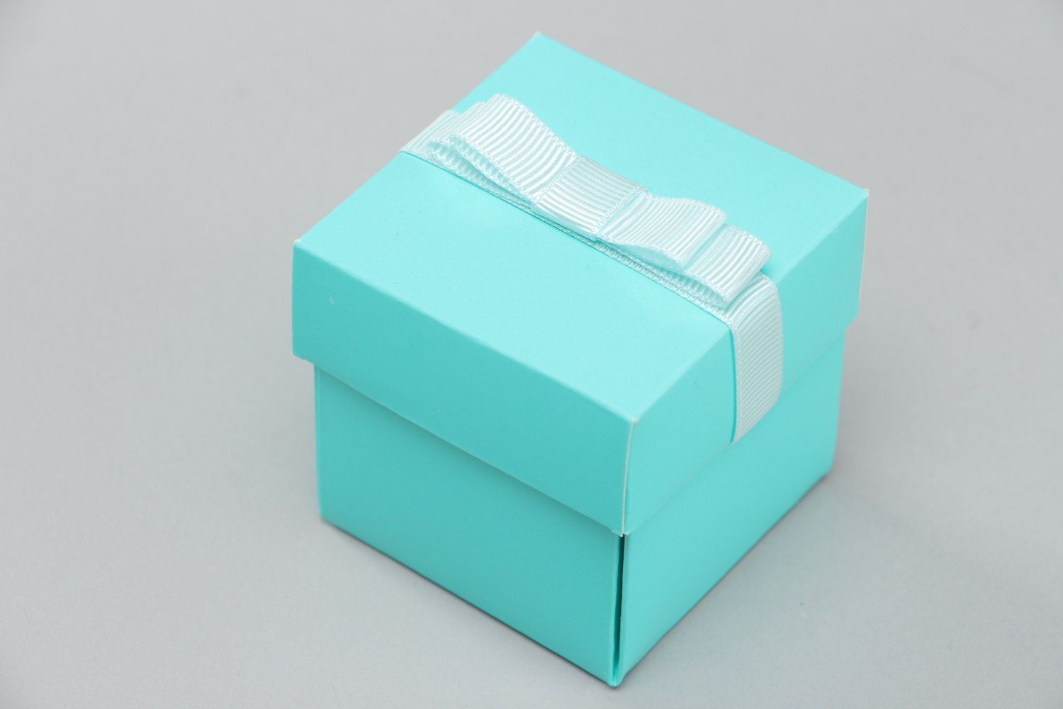 Handmade miniature square carton bonbonniere box of blue color with cute bow photo 3