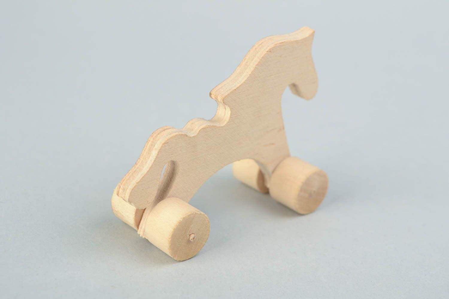 Material para manualidades juguete de madera hecho a mano caballo de ruedas foto 4