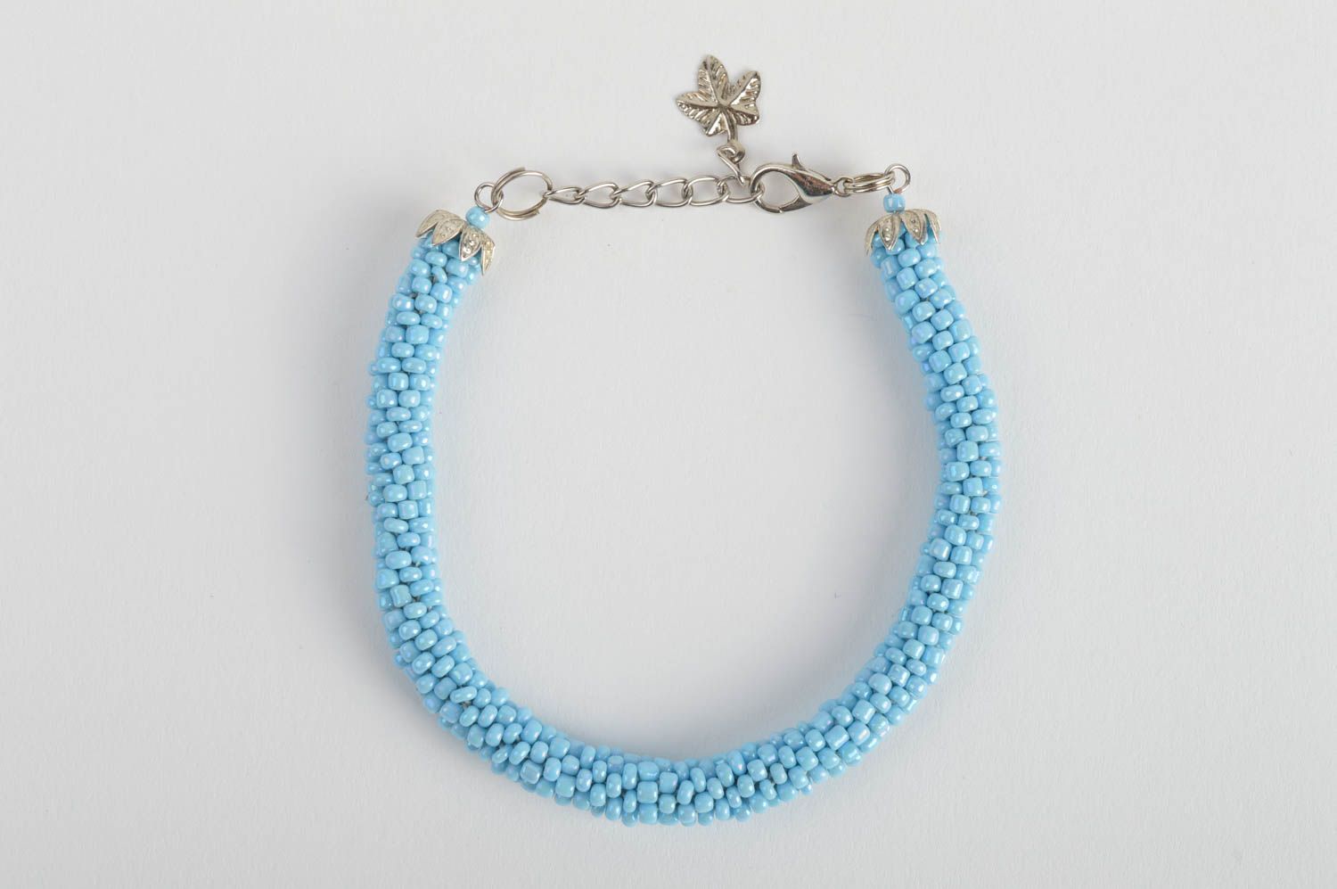 Handmade laconic beaded cord wrist bracelet of blue color for women photo 2