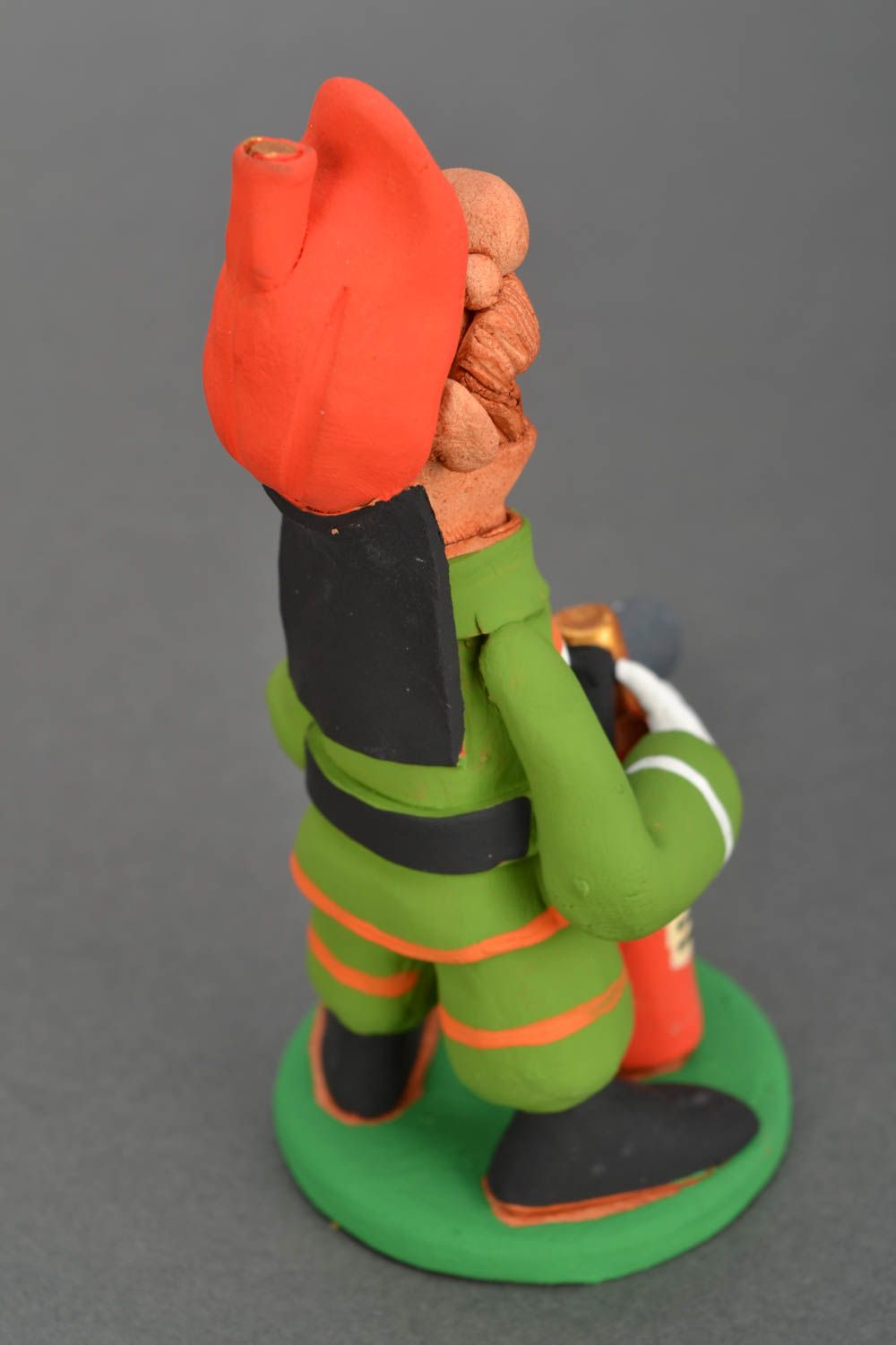 Figura de arcilla Bombero con extintor de fuego foto 5