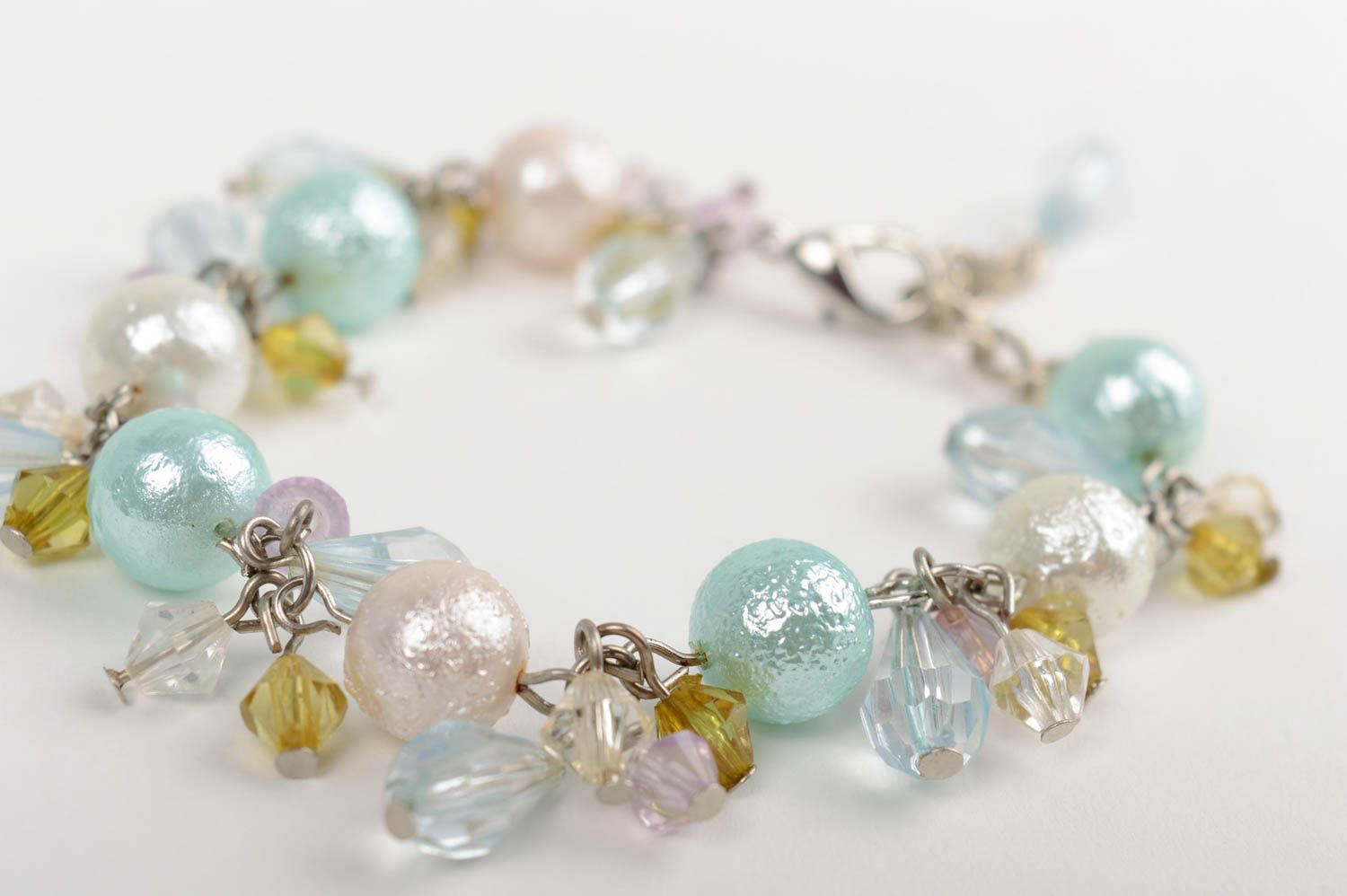 Handmade designer wrist bracelet with ceramic pearls and Czech crystal charms photo 2