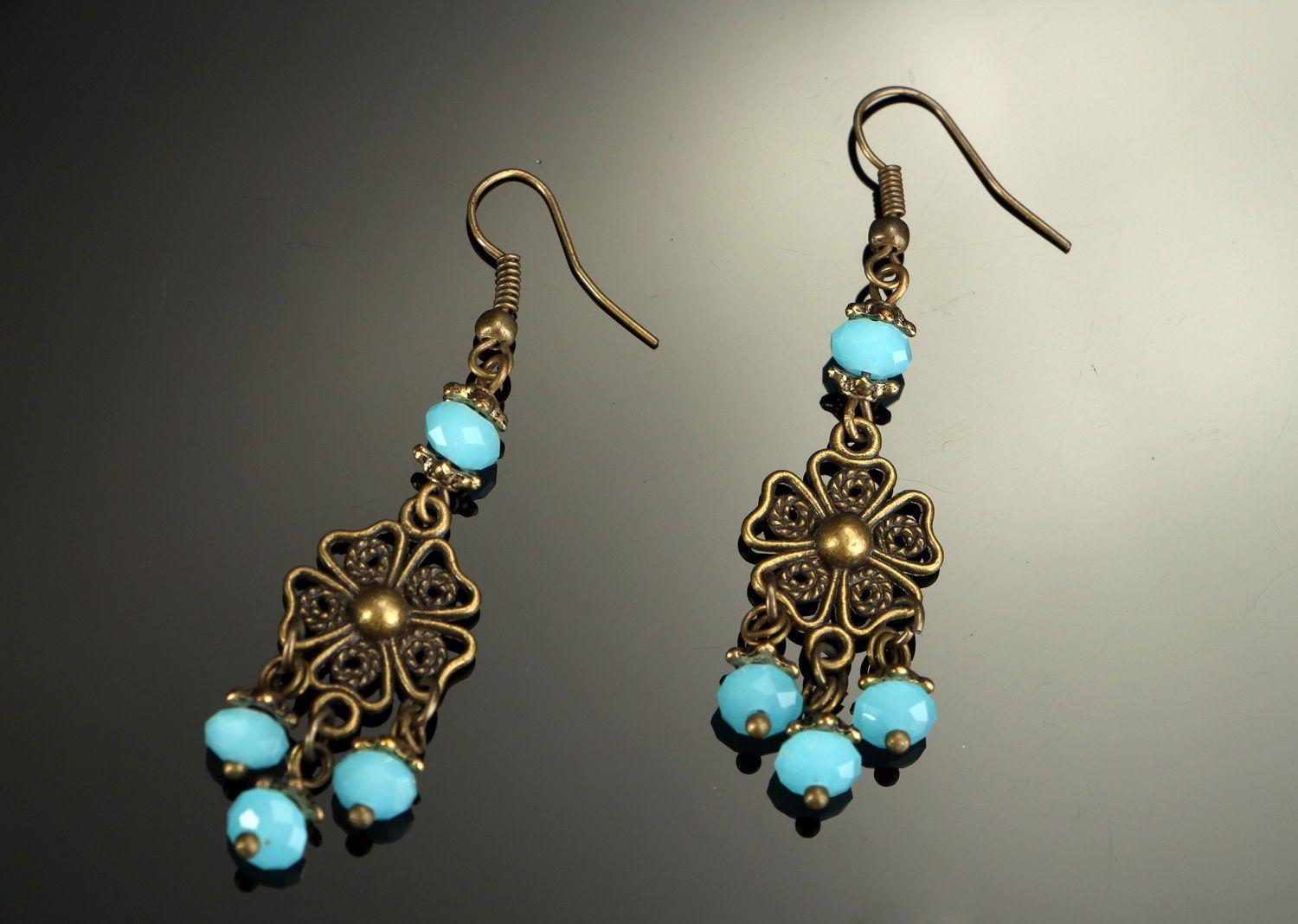 Earrings with bronze and crystal photo 1