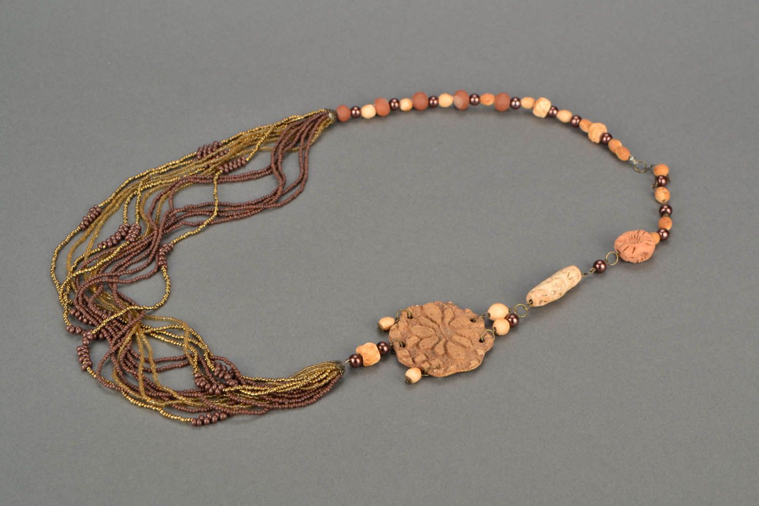 Necklace made of natural clay and beads photo 3