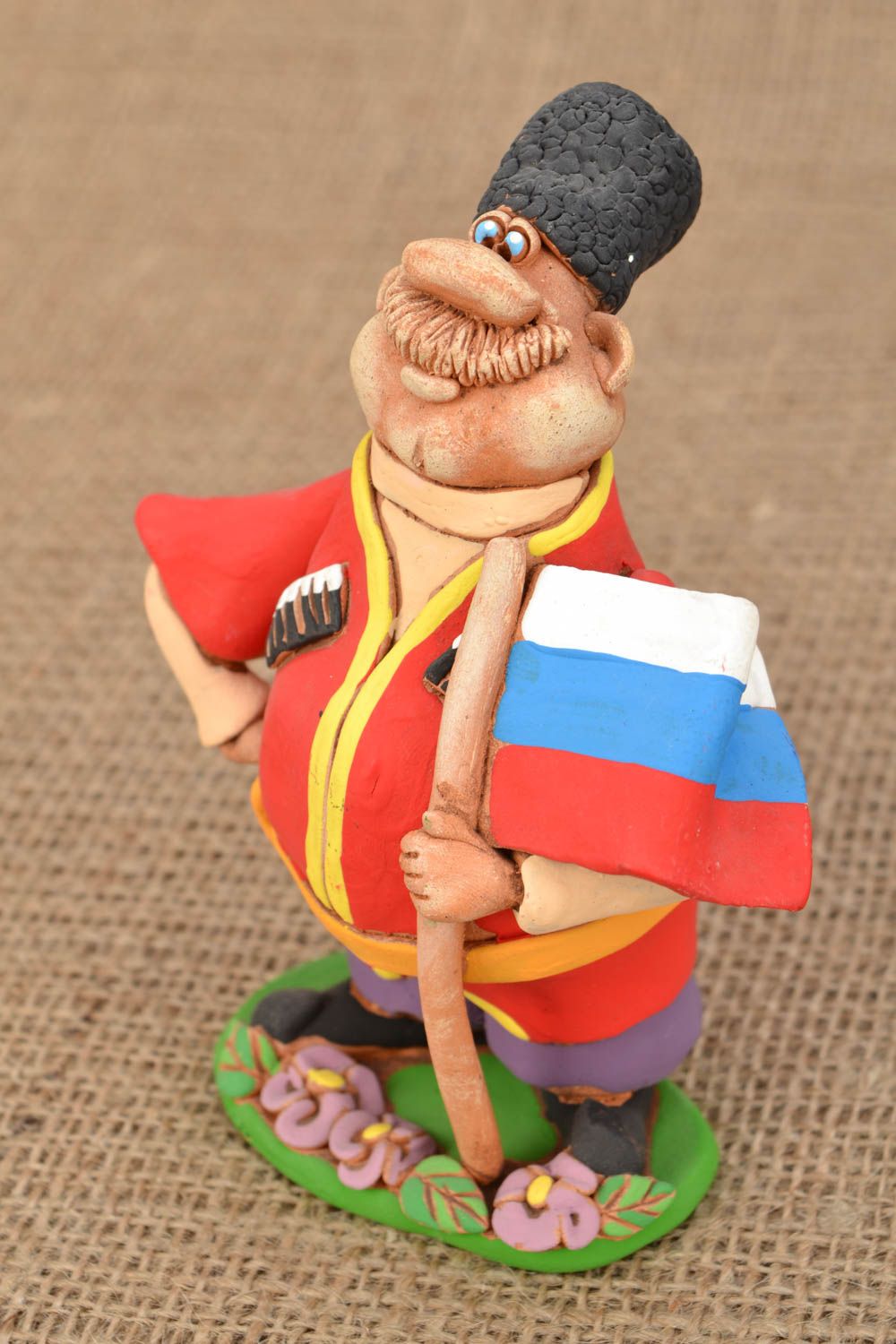 Ceramic figurine Cossack with Russian flag photo 1