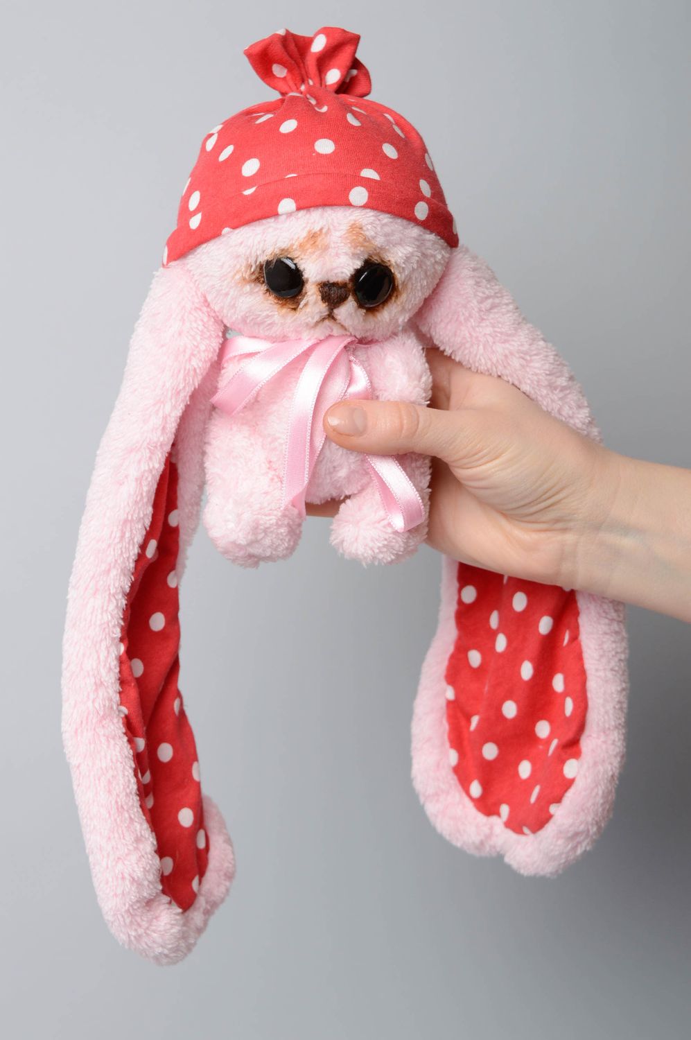 Pink artificial fur toy hare with long ears photo 3