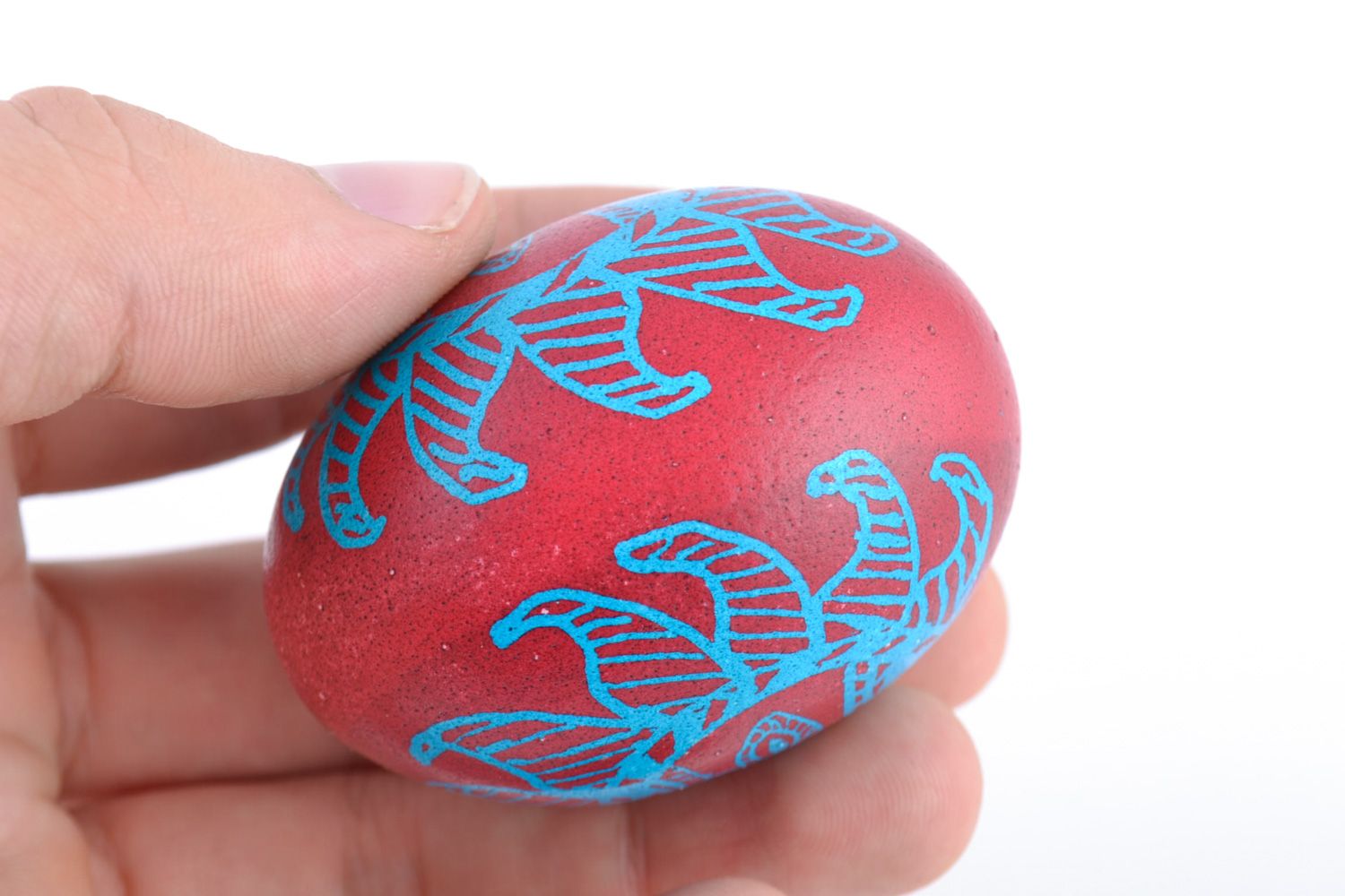 Beautiful handmade painted Easter egg in blue and red colors interior decoration photo 2