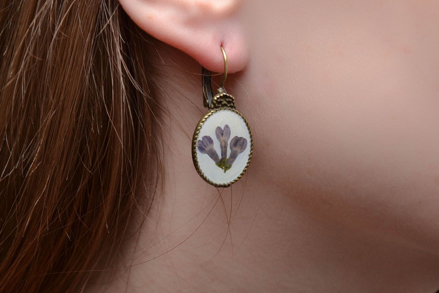 White earrings with natural flowers and epoxy resin photo 2