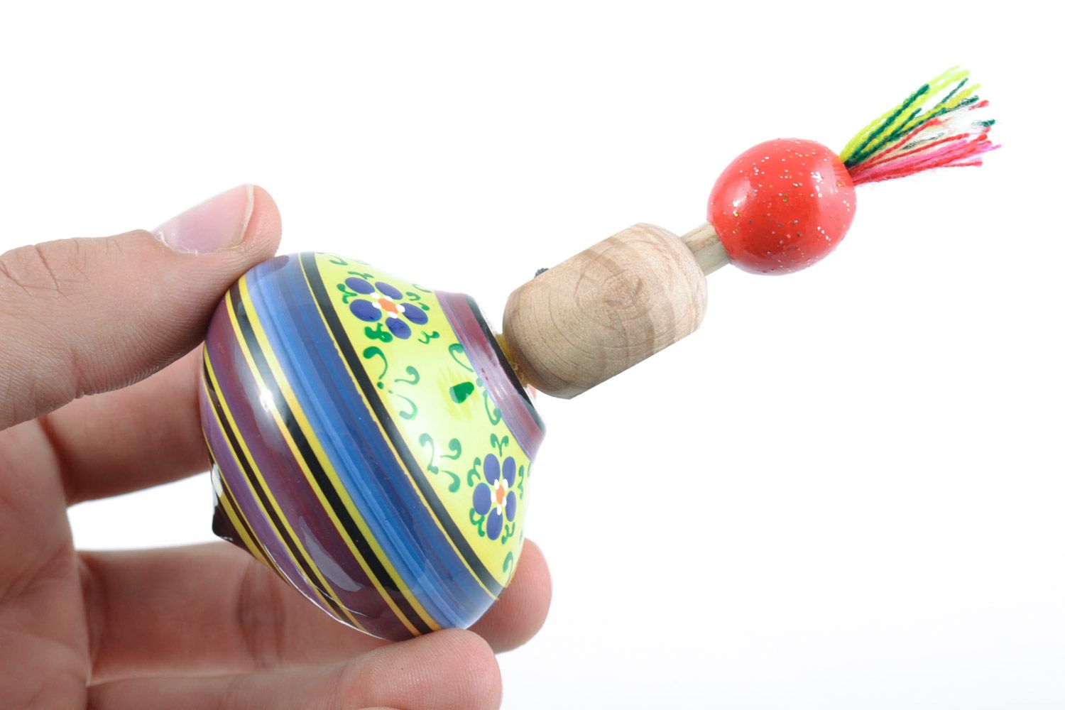 Handmade decorative spinning top with a ring for the development of fine motor skills of the baby photo 2