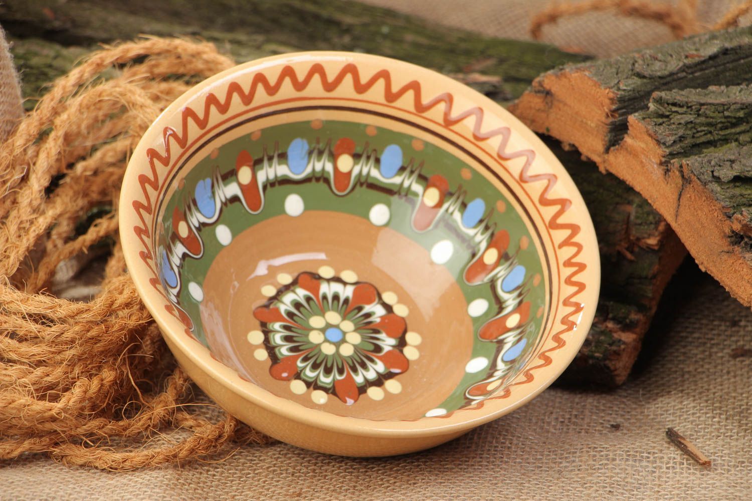 Handmade large red clay bowl with ornament coated with colorful glaze 500 ml photo 1