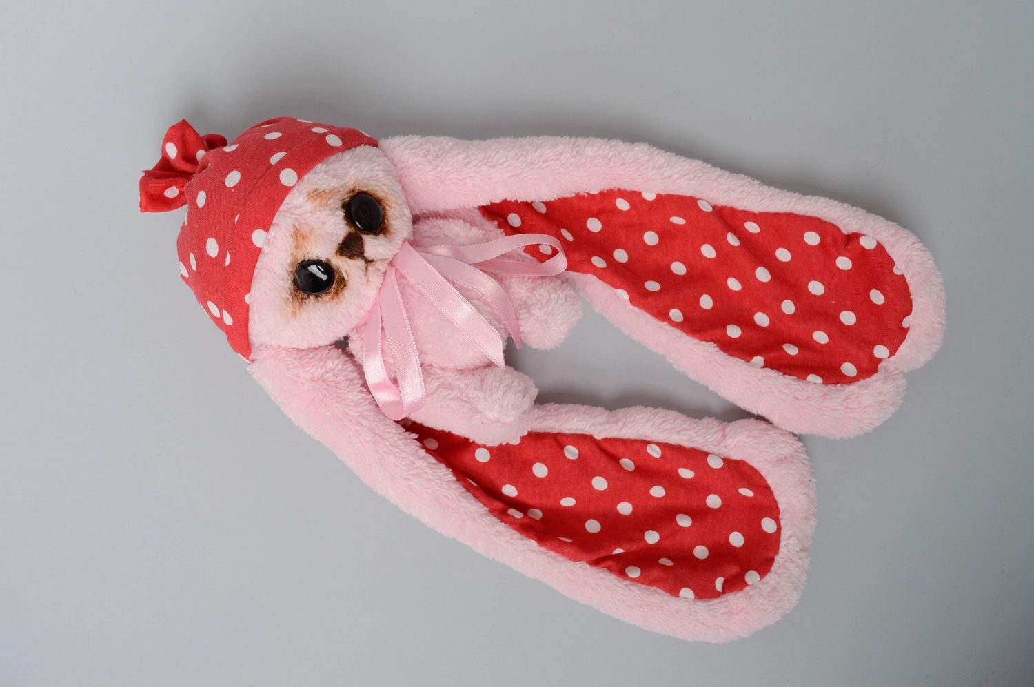 Pink artificial fur toy hare with long ears photo 2