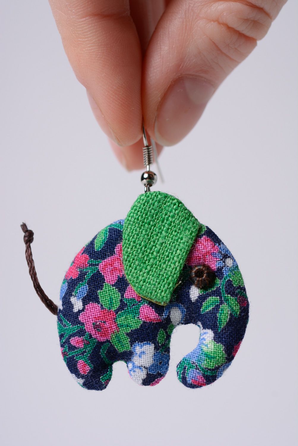 Beautiful earrings hand made of linen and cotton fabric in the shape of elephants photo 3