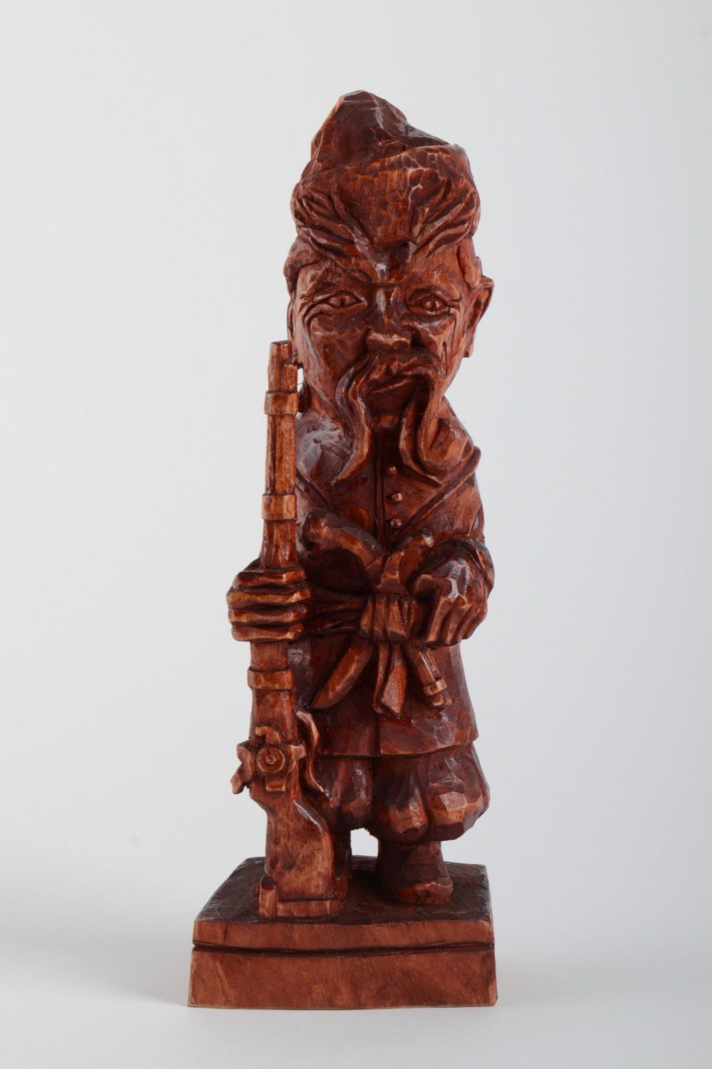 Handmade carved tinted wooden figurine coated with varnish for table decoration photo 2