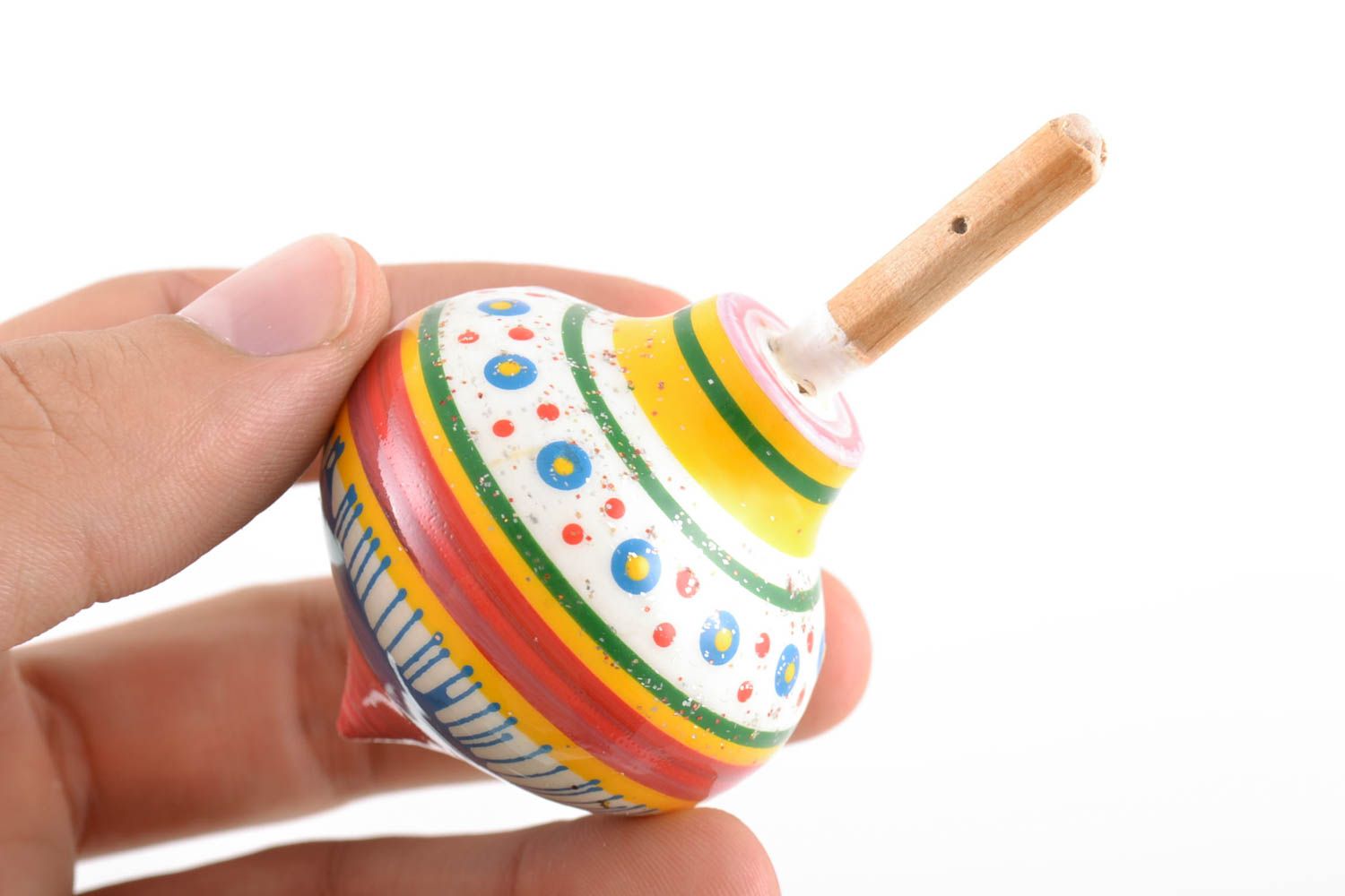Деревянная юла ручной работы маленькая игрушка для ребенка с росписью экокрасками фото 2
