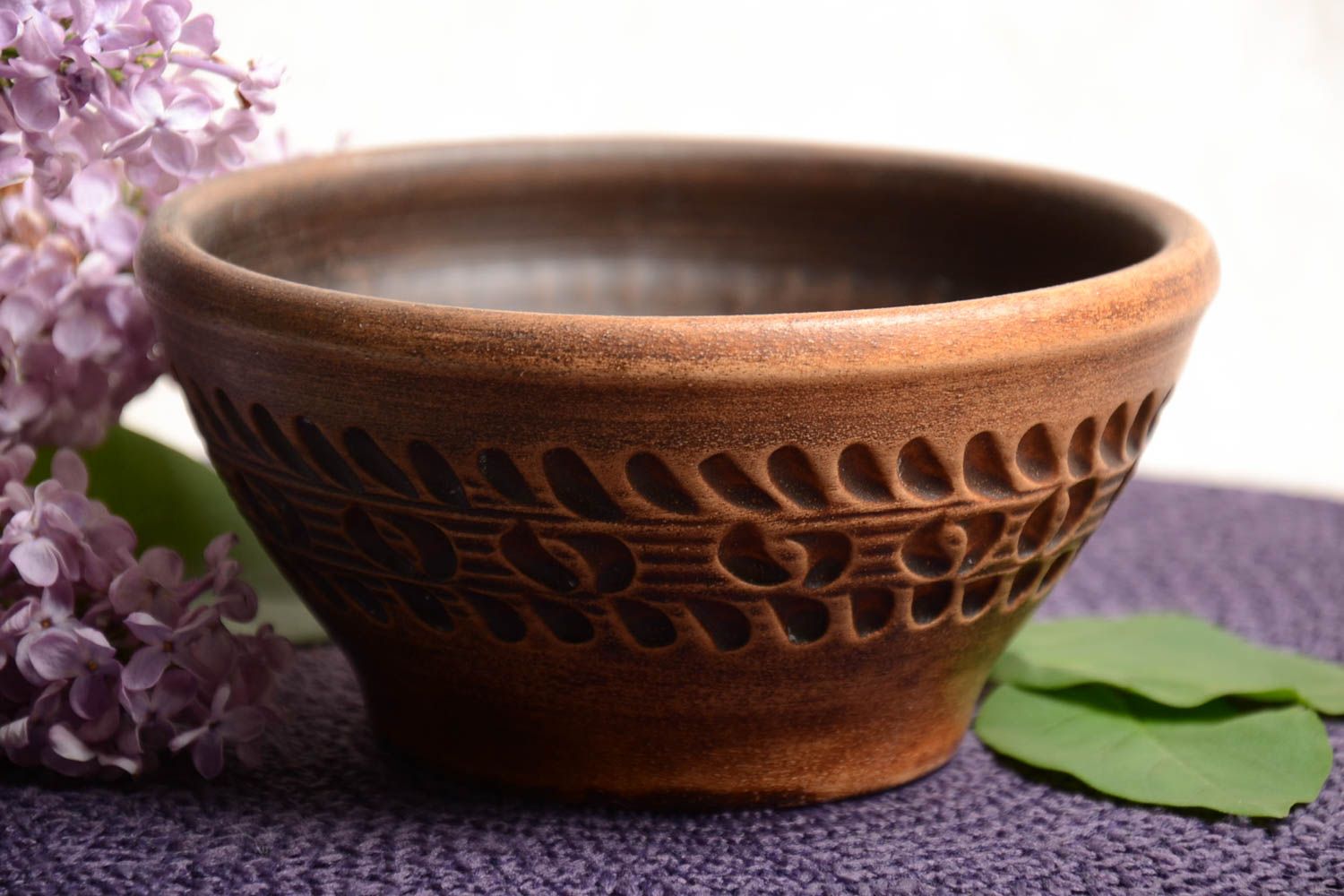 Beautiful deep handmade molded clay bowl kilned with milk 650 ml photo 1
