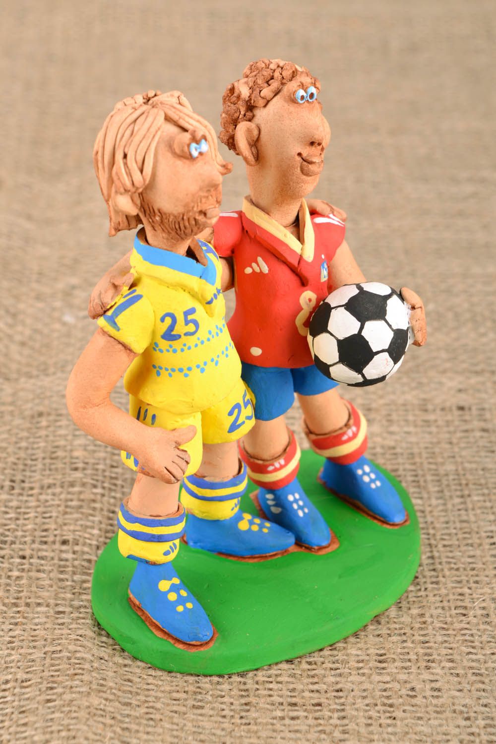 Schöne Statuette zwei Fussballspielern foto 1