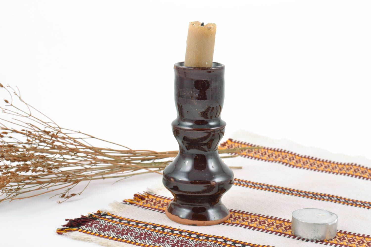 Candelero de arcilla cubierto con esmalte hecho a mano para una vela foto 1