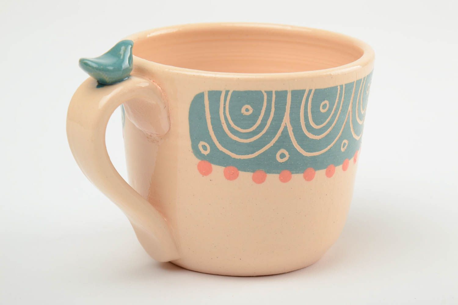 Glazed 11 oz ceramic cup of peach color with a bird on the handle photo 4