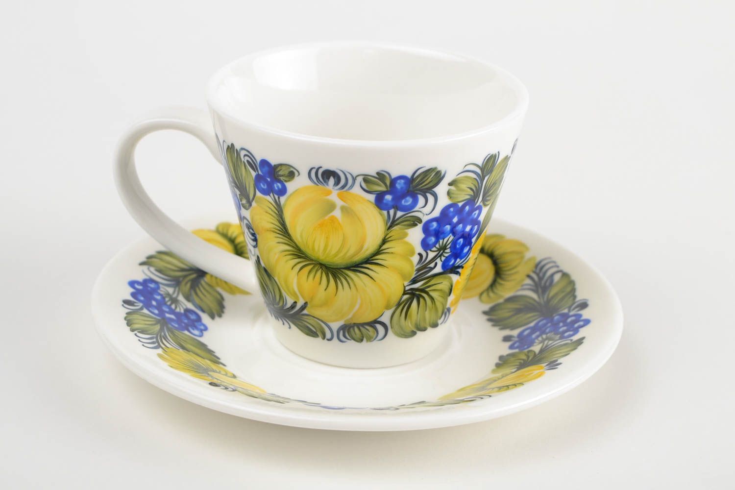 Porcelain white 5 oz coffee cup with saucer and yellow, blue floral pattern photo 4