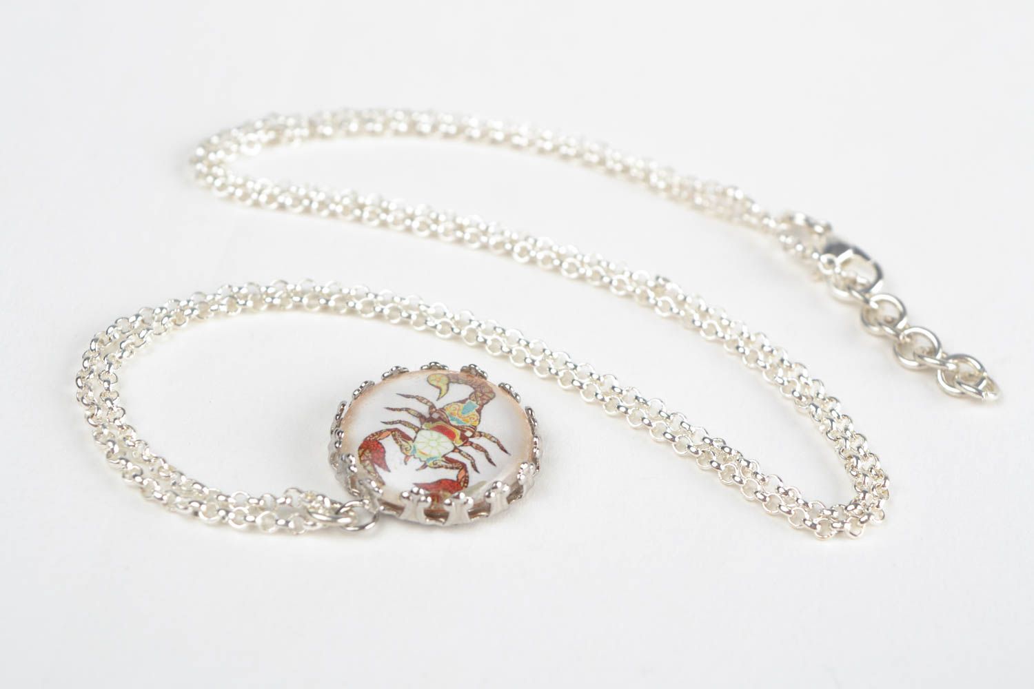Handmade designer round white glass pendant with Scorpio symbol on metal chain photo 3